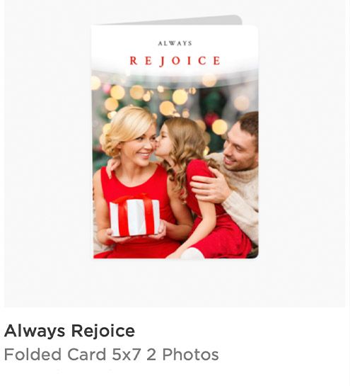 Always Rejoice folded 5x7 Christmas card featuring a family in red holiday attire with bokeh lights background.