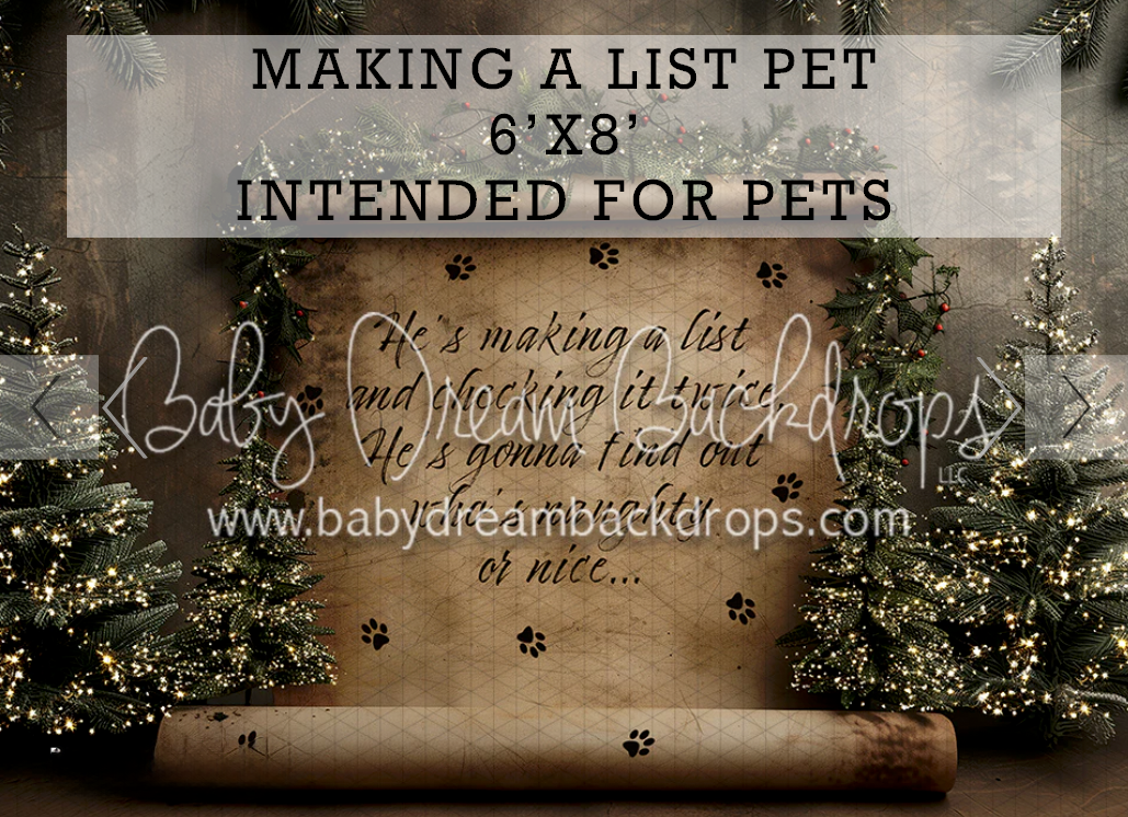 Making a List Pet 6x8 photography backdrop with Christmas trees, paw prints, and a Santa scroll design.