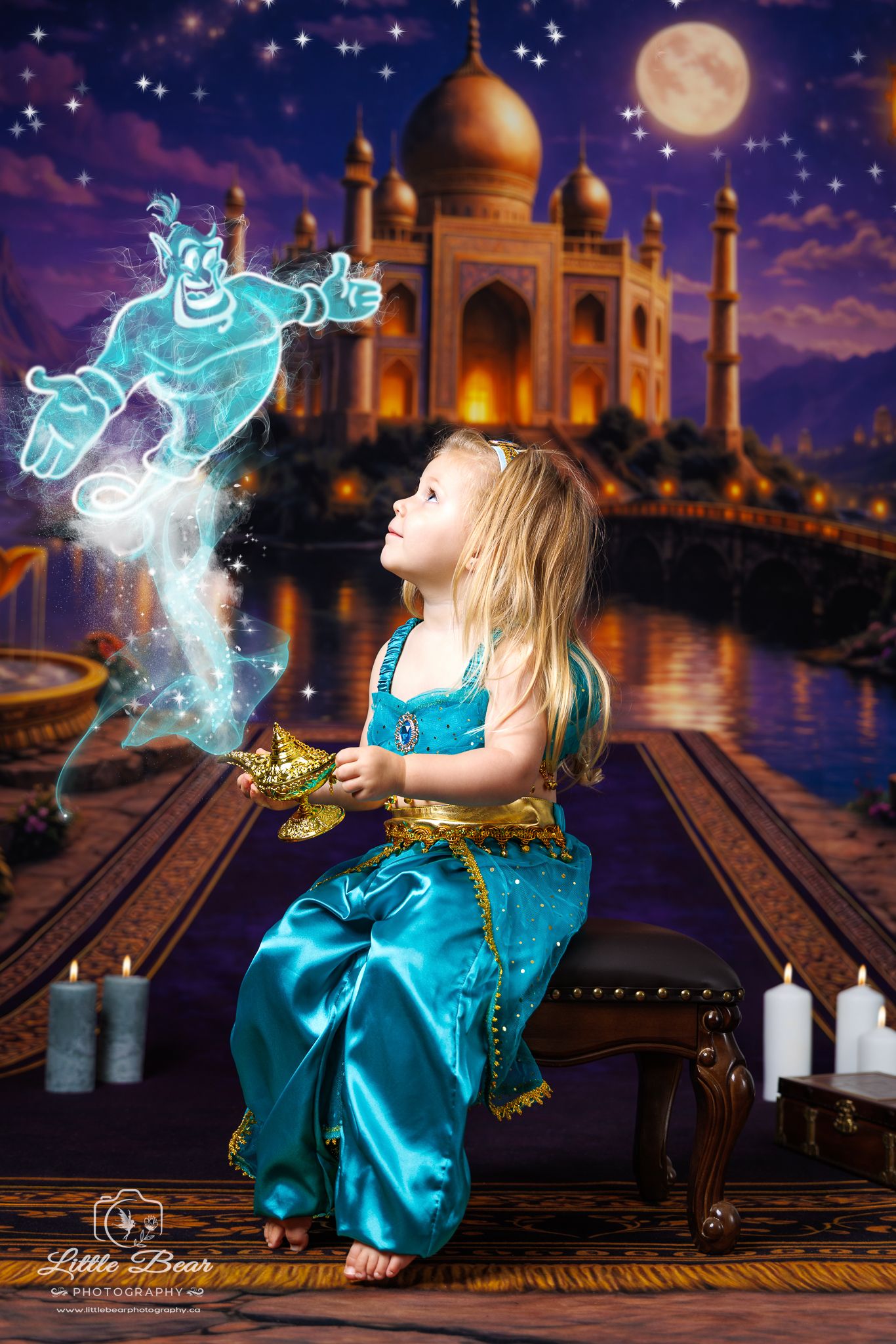 Little girl in teal Jasmine costume holds magic lamp as glowing genie appears, with Taj Mahal backdrop.