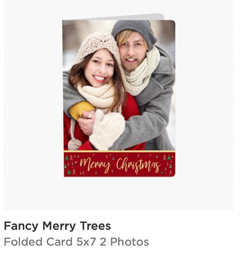 Fancy Merry Trees folded 5x7 Christmas card featuring a couple in winter attire with a red Merry Christmas banner.
