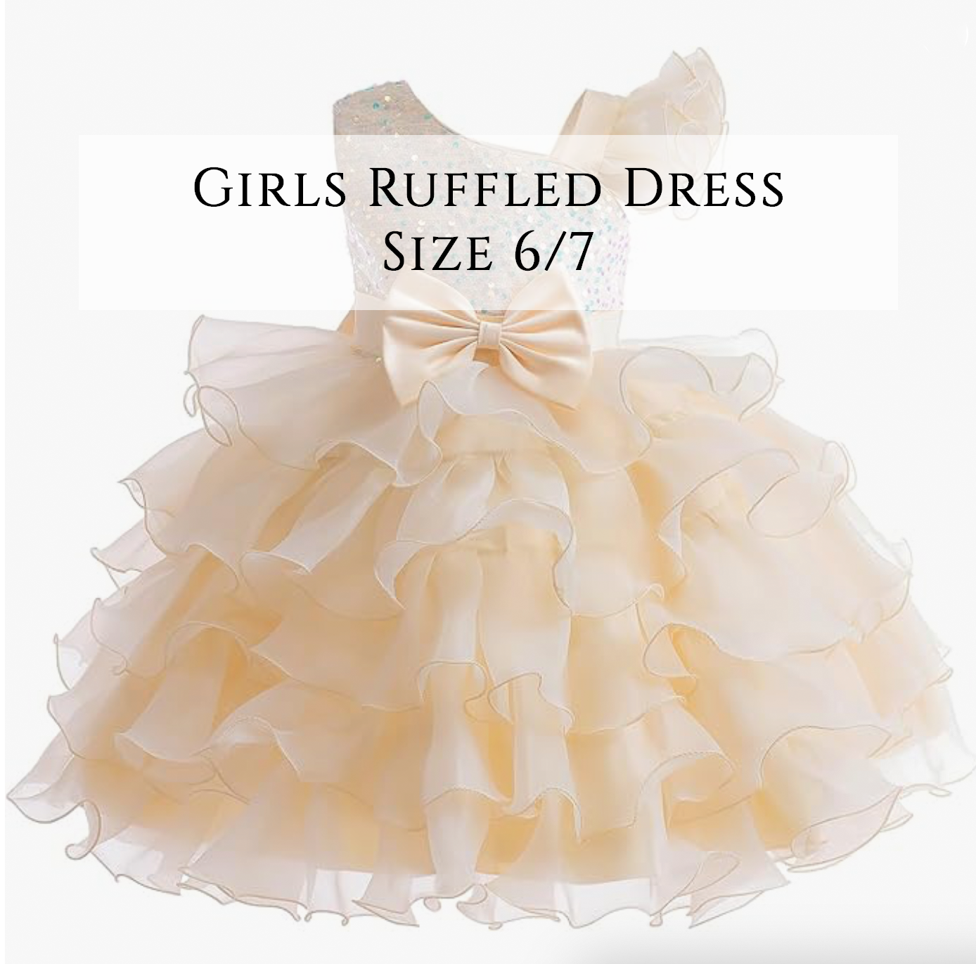 Girls ruffled champagne tulle dress size 6/7 with large bow accent.