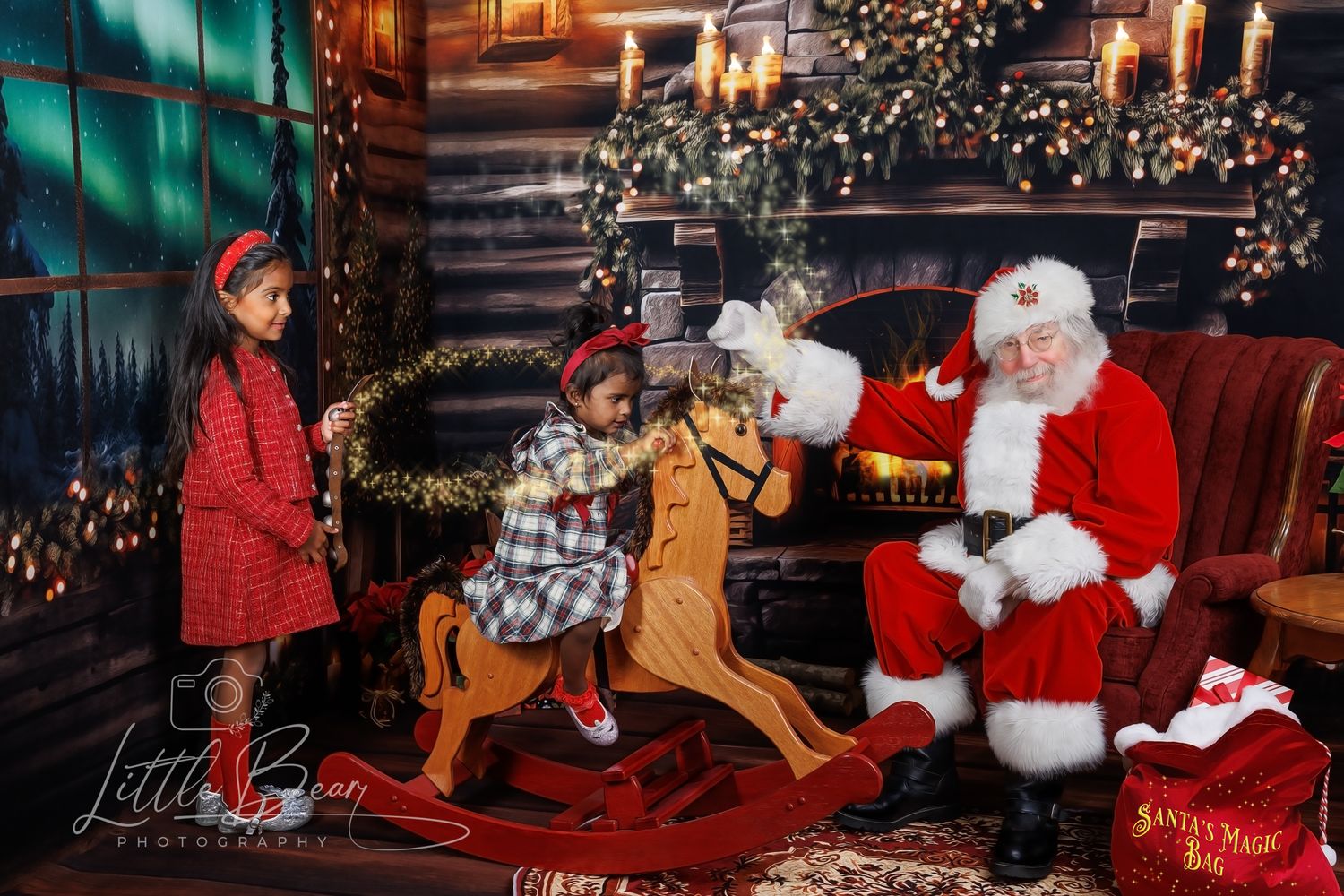 Two children pose with Santa Claus near a rocking horse and Christmas tree in a cozy holiday photo session.