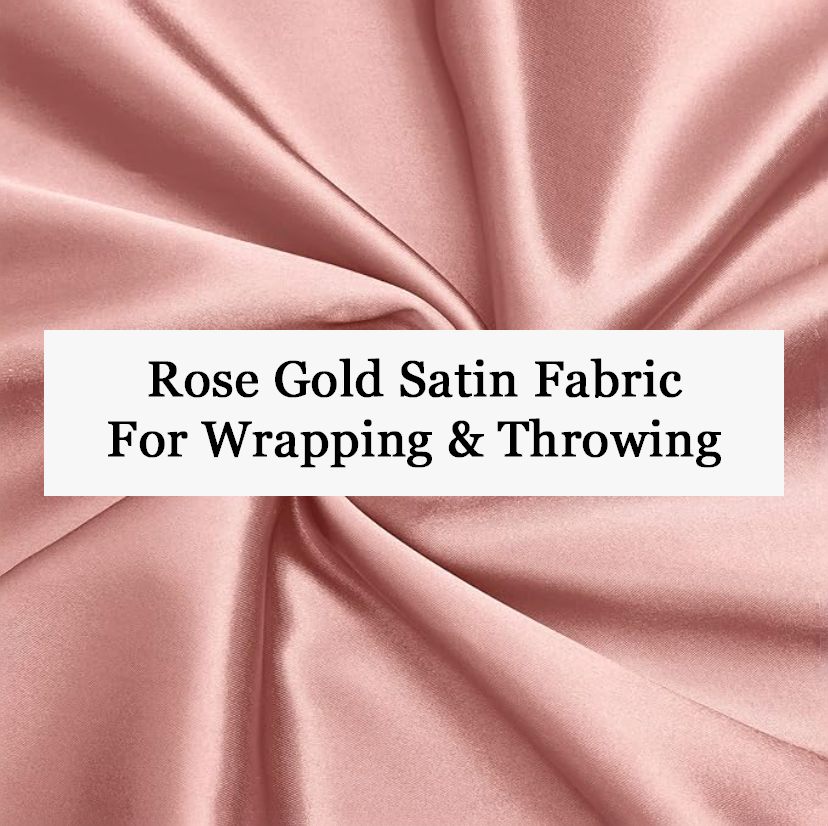Rose gold satin fabric for wrapping and throwing during elegant maternity photography sessions.