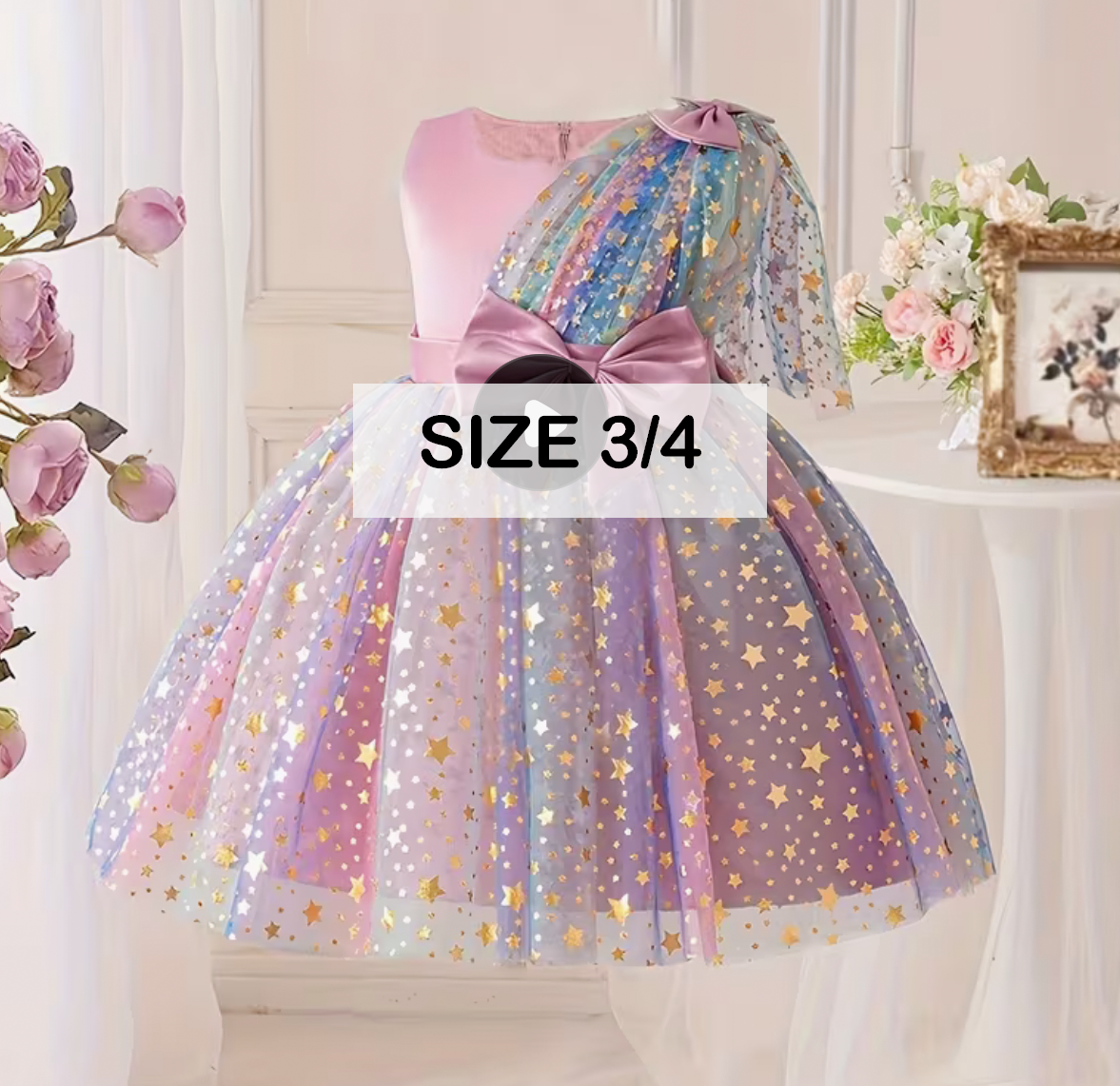 Girls size 3/4 pink rainbow star sequin tulle party dress with colorful bow and sheer overlay.