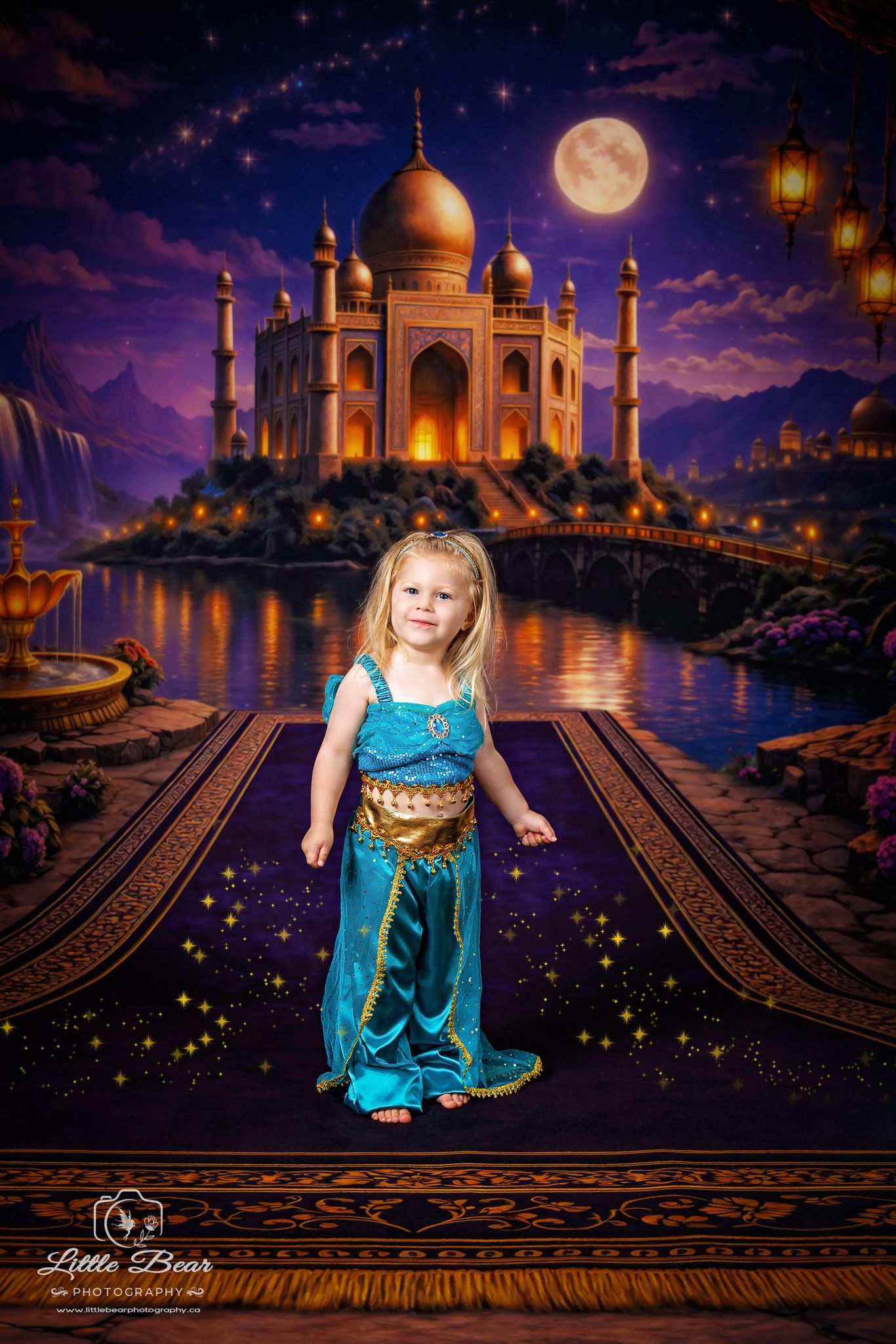 Young girl in Princess Jasmine costume stands on magic carpet before illuminated Taj Mahal backdrop under full moon.