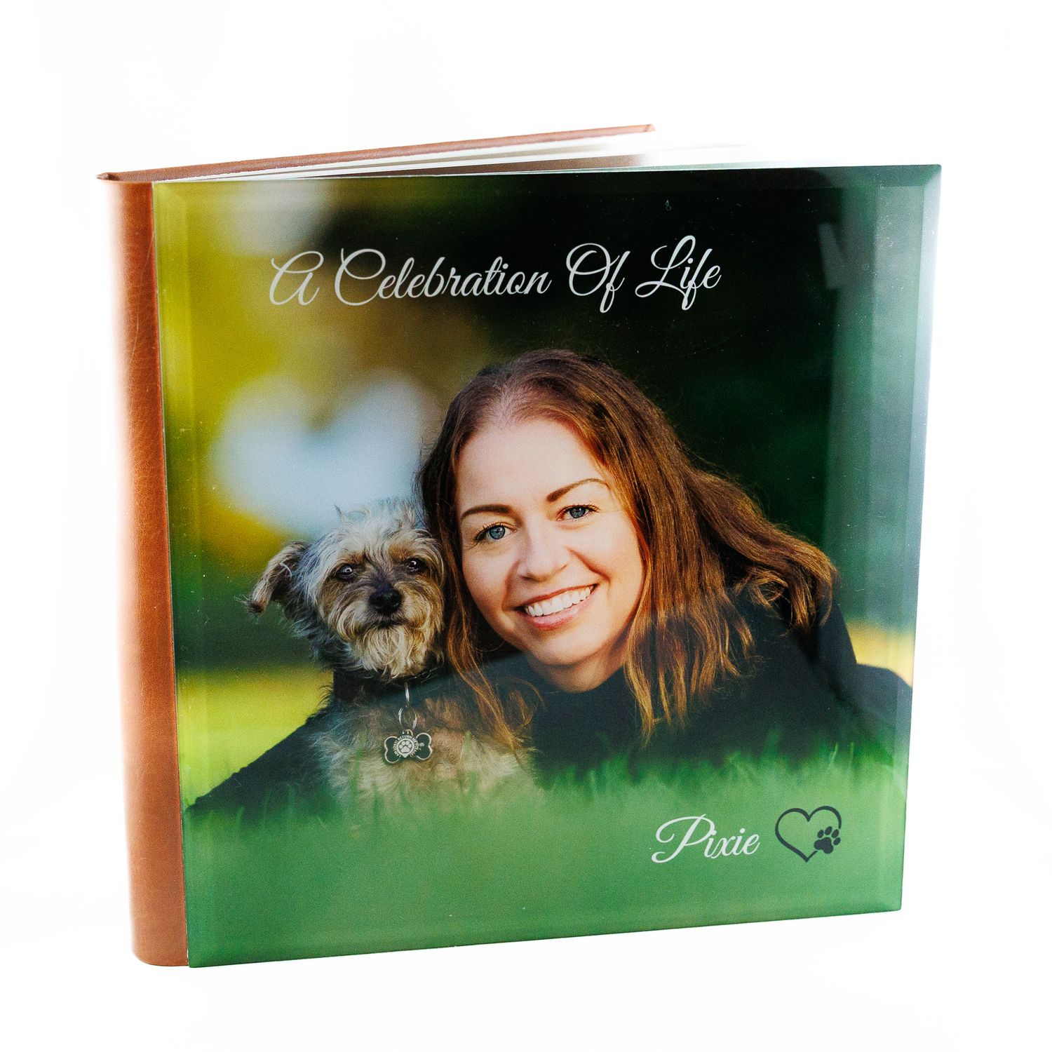 Personalized celebration of life photo book featuring woman with her dog named Pixie on cover.