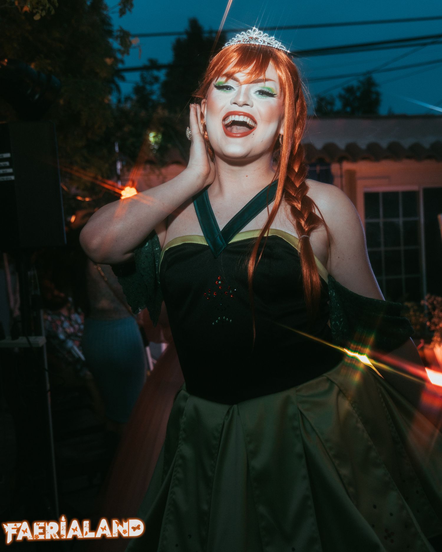Photograph of drag artist cosplaying as Anna from Frozen. Photo by Los Angeles photo/film production company, YUQ Studios.