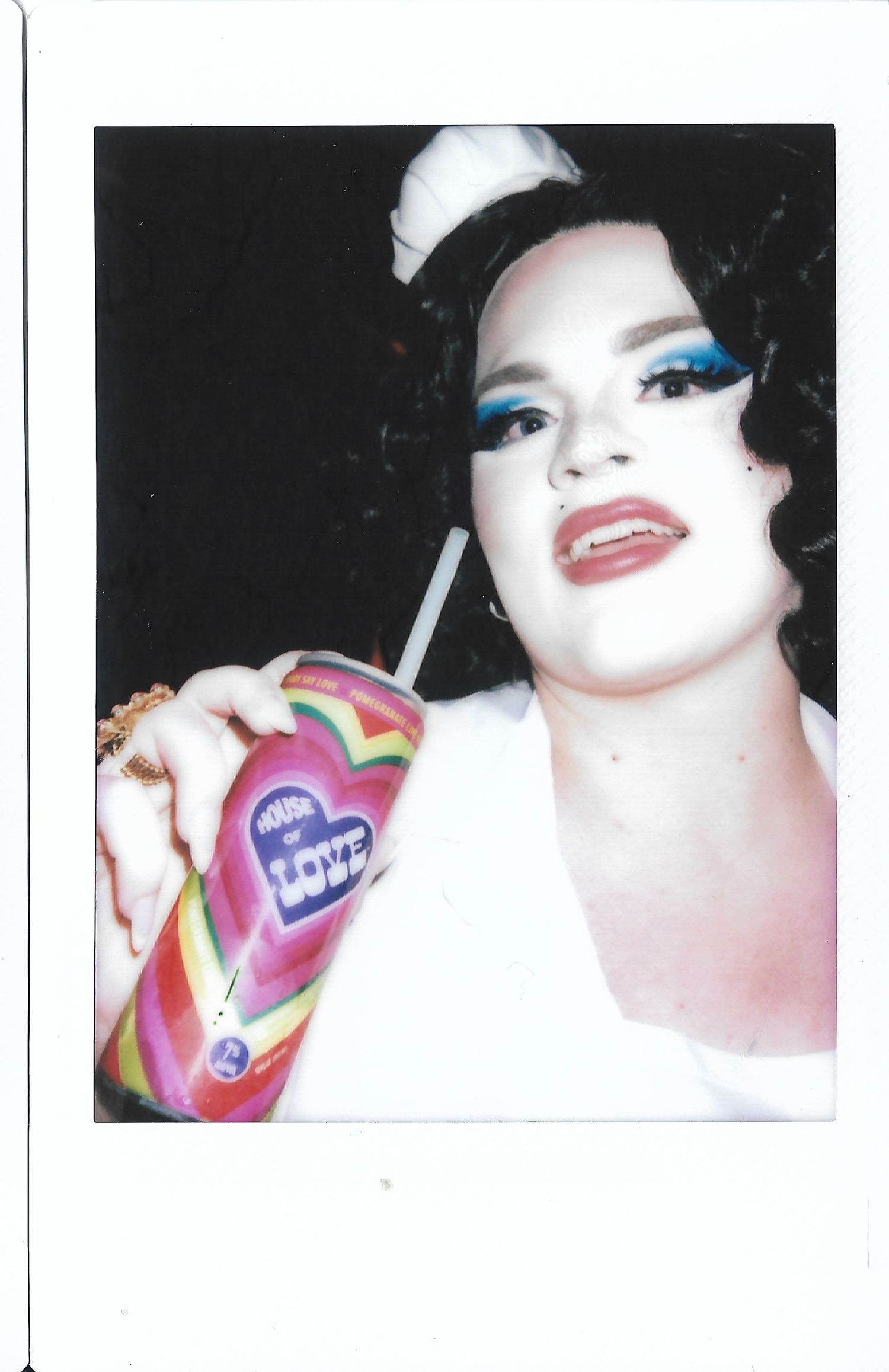 Photograph of drag artist drinking a canned cocktail. Photo by Los Angeles photo/film production company, YUQ Studios.