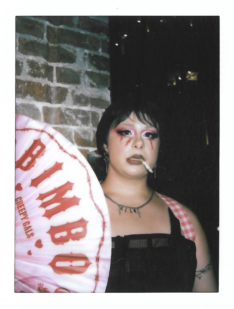 Photograph of drag artist smoking a cigarette. Photo by Los Angeles photo/film production company, YUQ Studios.