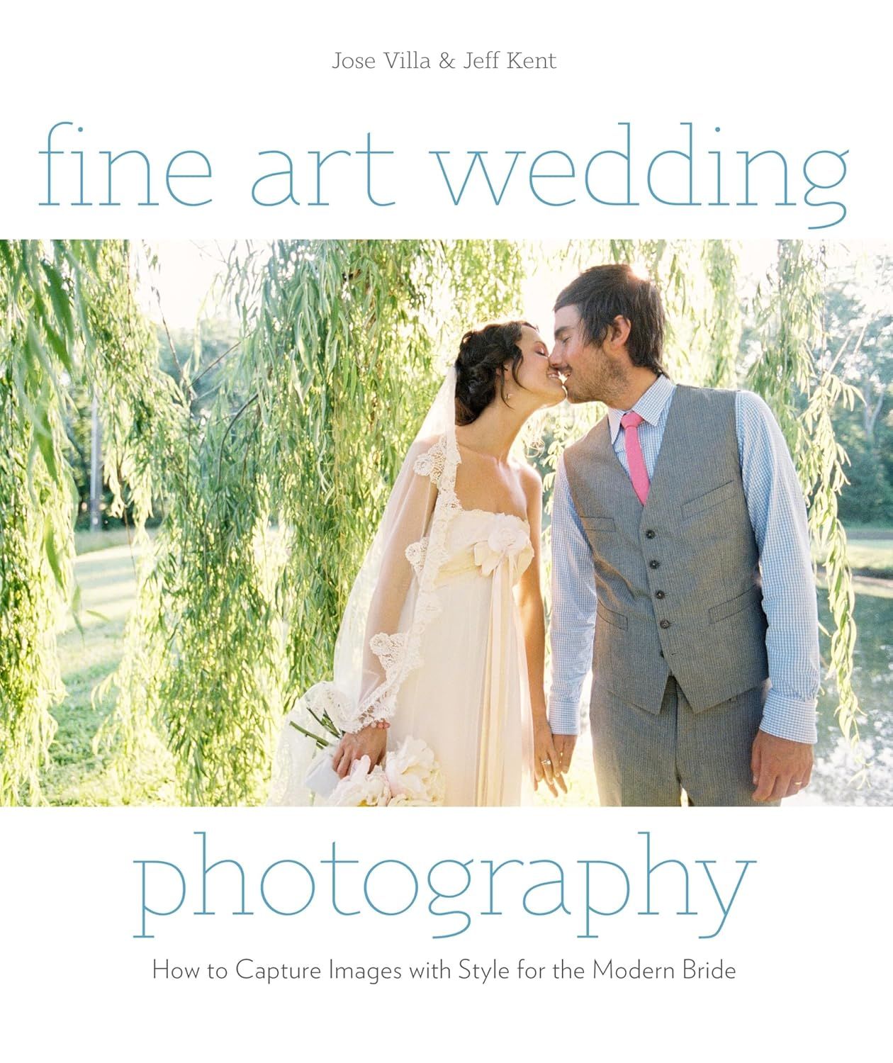 A romantic outdoor wedding photography session with a couple embracing under willow trees in soft natural light.
