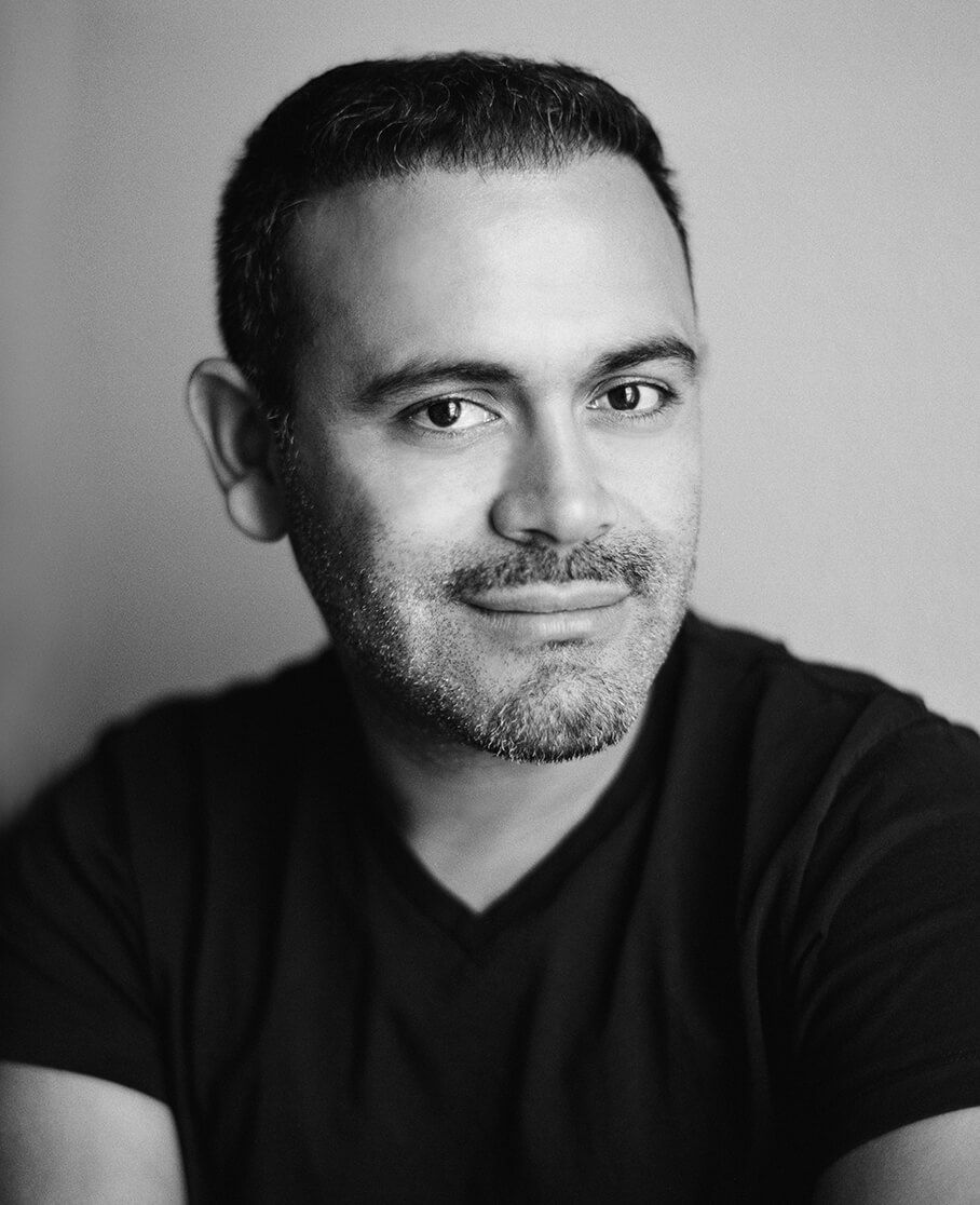 A series of black and white portrait shots showing a person in a dark shirt against a light background.