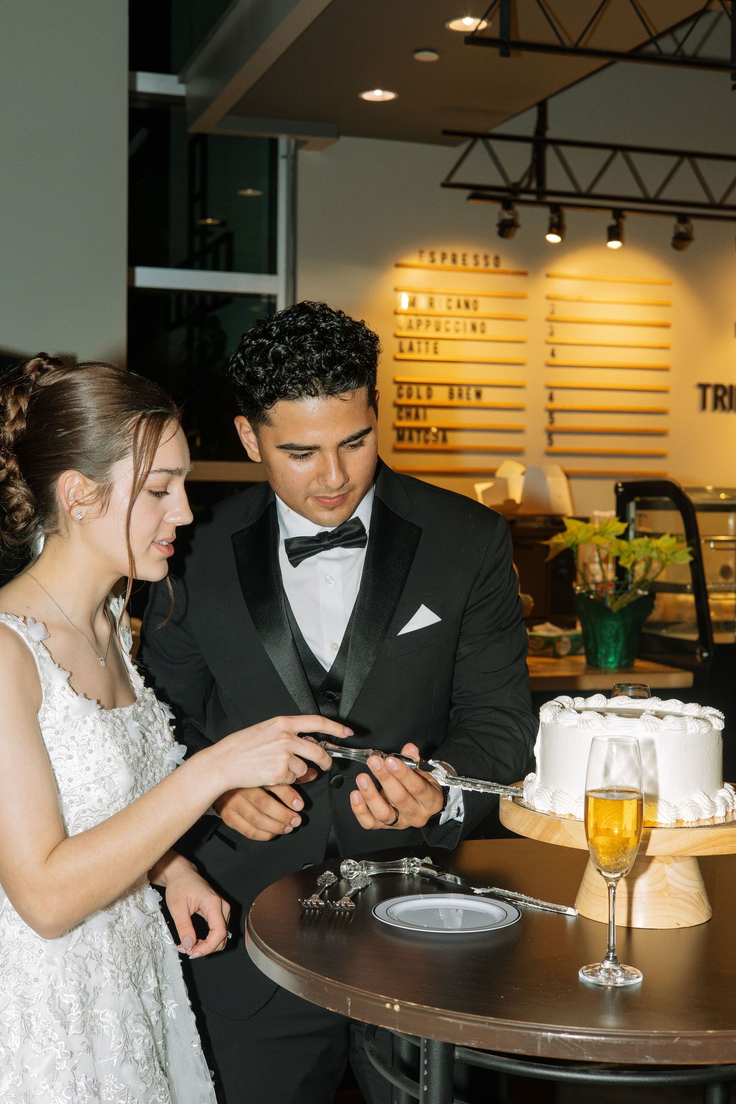 wedding day bride and groom cake cutting Tampa Florida wedding photographer