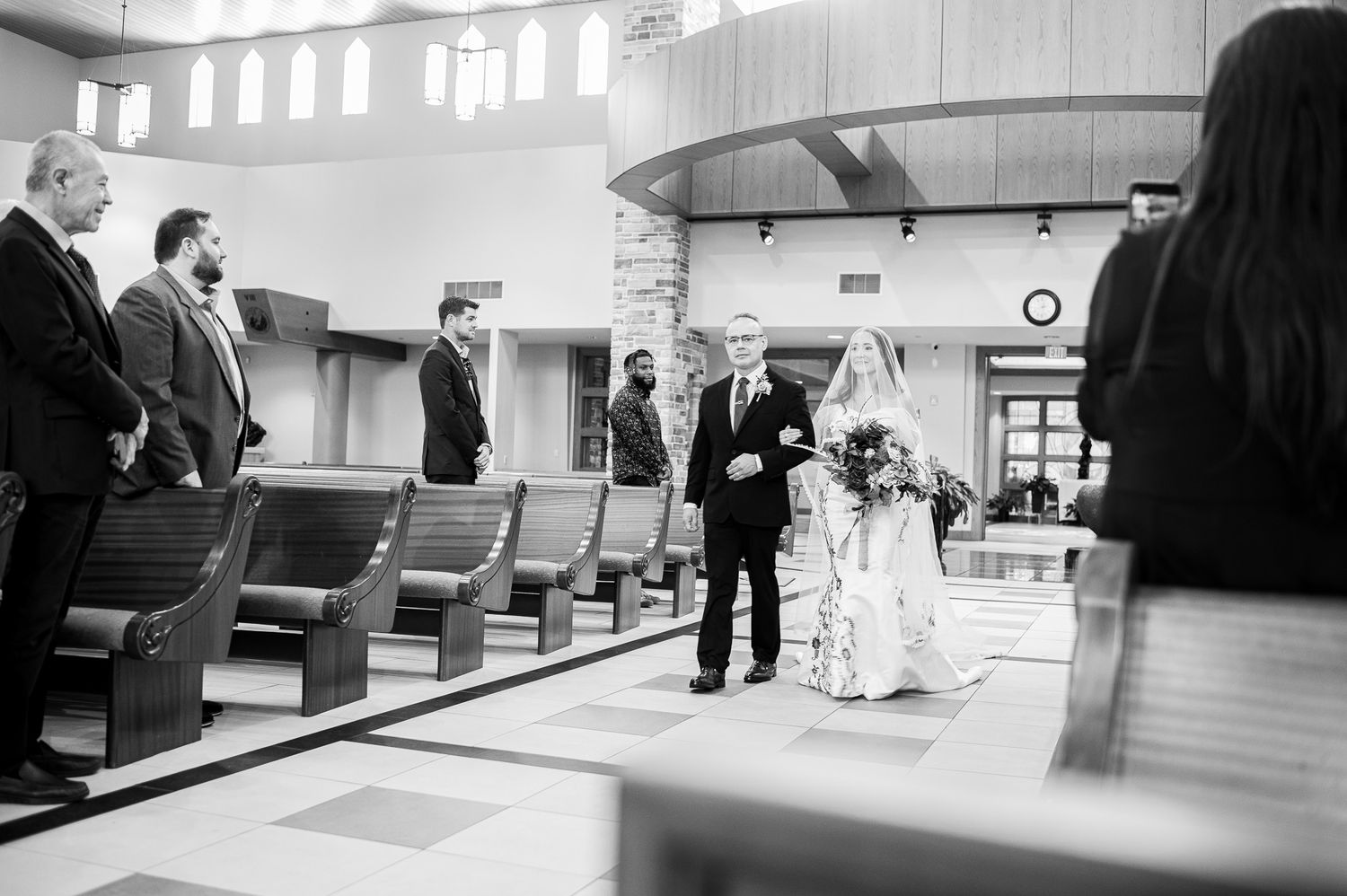 Catholic Church wedding Tampa Florida wedding photographer bride walking down the aisle