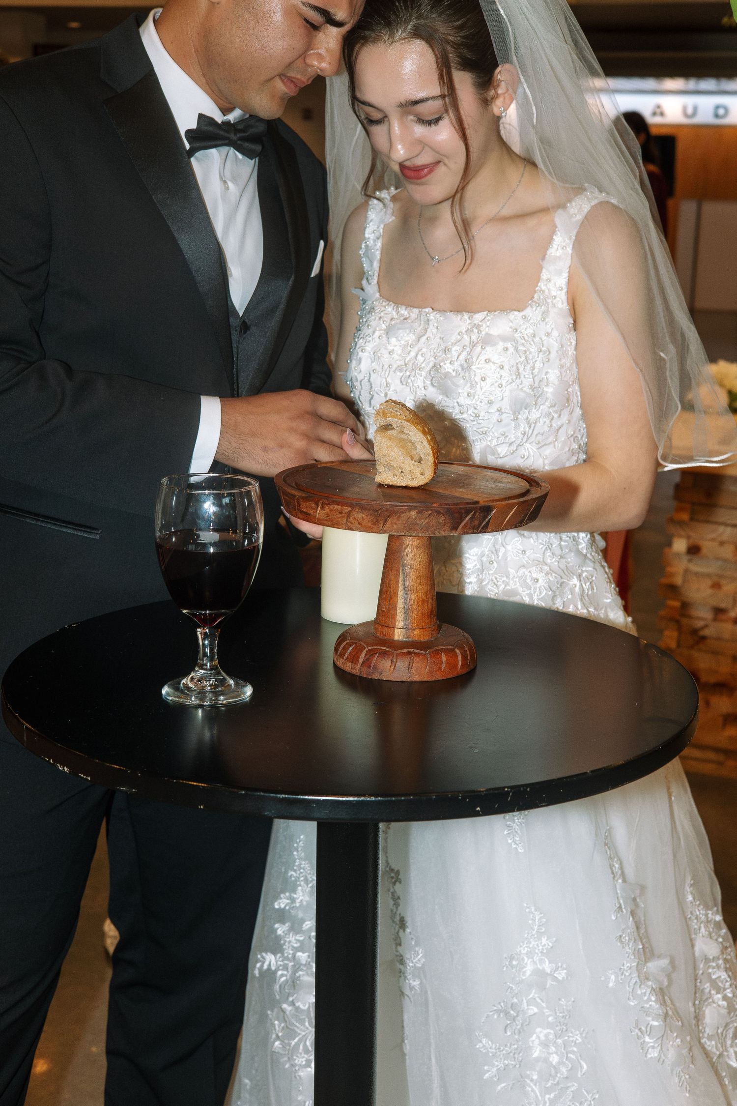 Wedding day ceremony bride and groom communion Tampa Florida wedding photographer