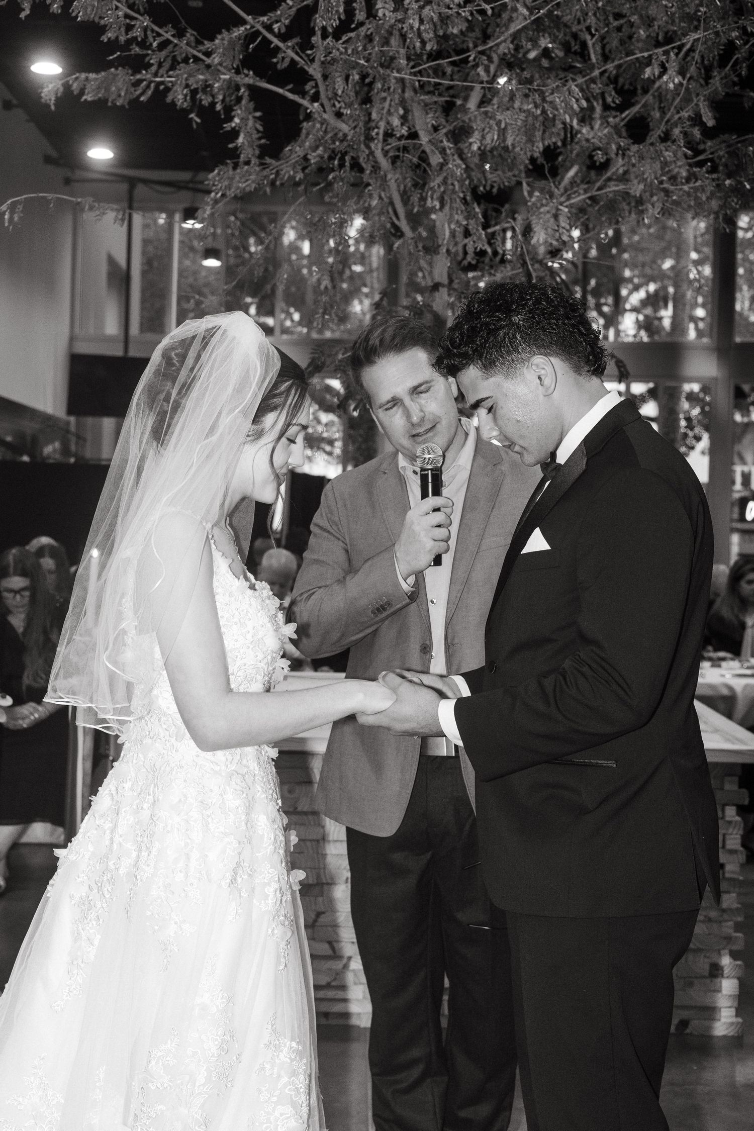 Wedding day ceremony bride and groom praying Tampa Florida wedding photographer