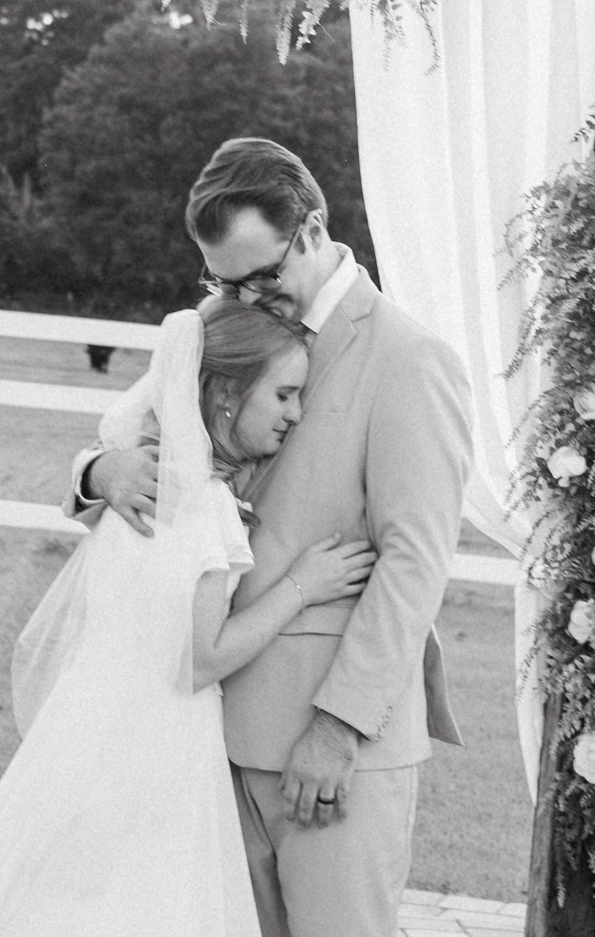 Candid wedding photo of couple looking at each other during their ceremony on their Tampa, Florida wedding day.