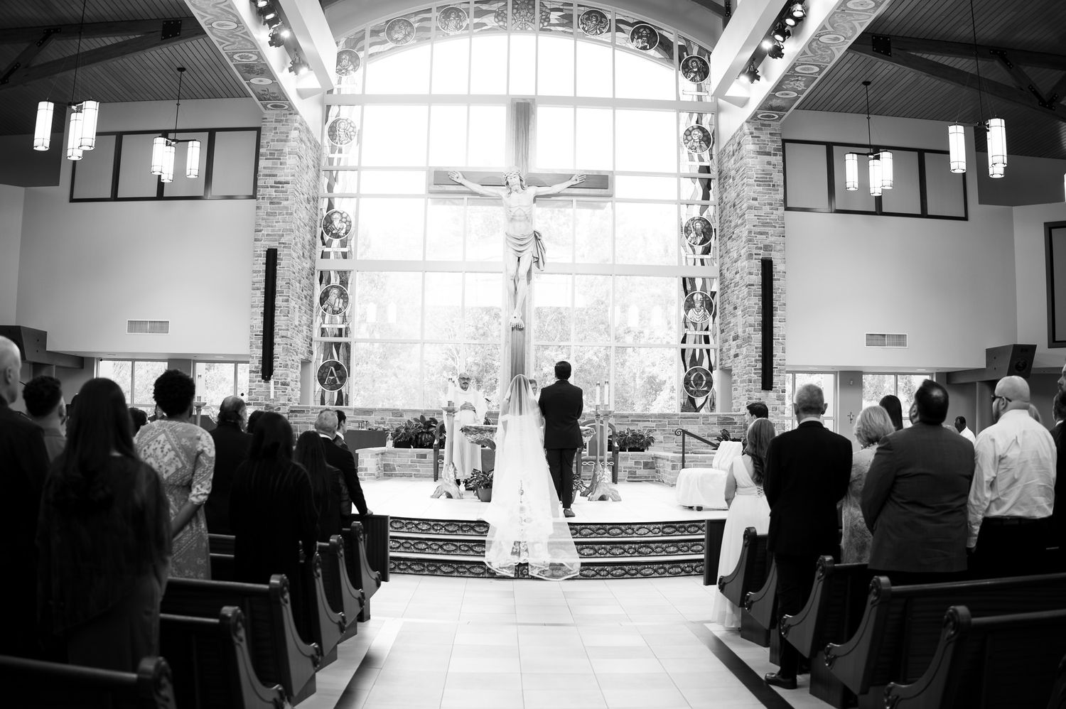 Catholic Church wedding Tampa Florida wedding photographer bride walking down the aisle