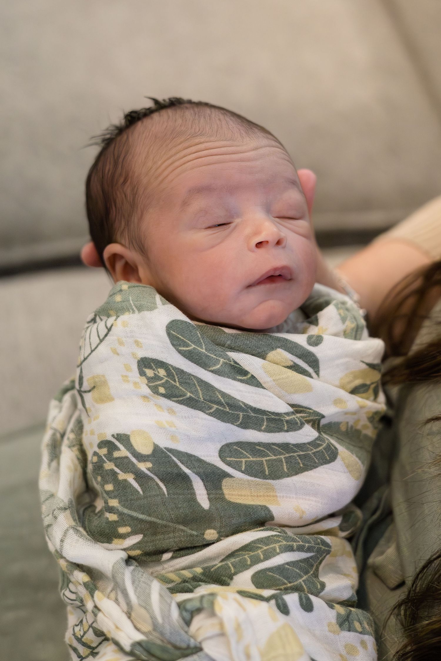 Detailed shot of newborn baby during in home lifestyle newborn session with McKinney newborn photographer Reagan Marie Photography
