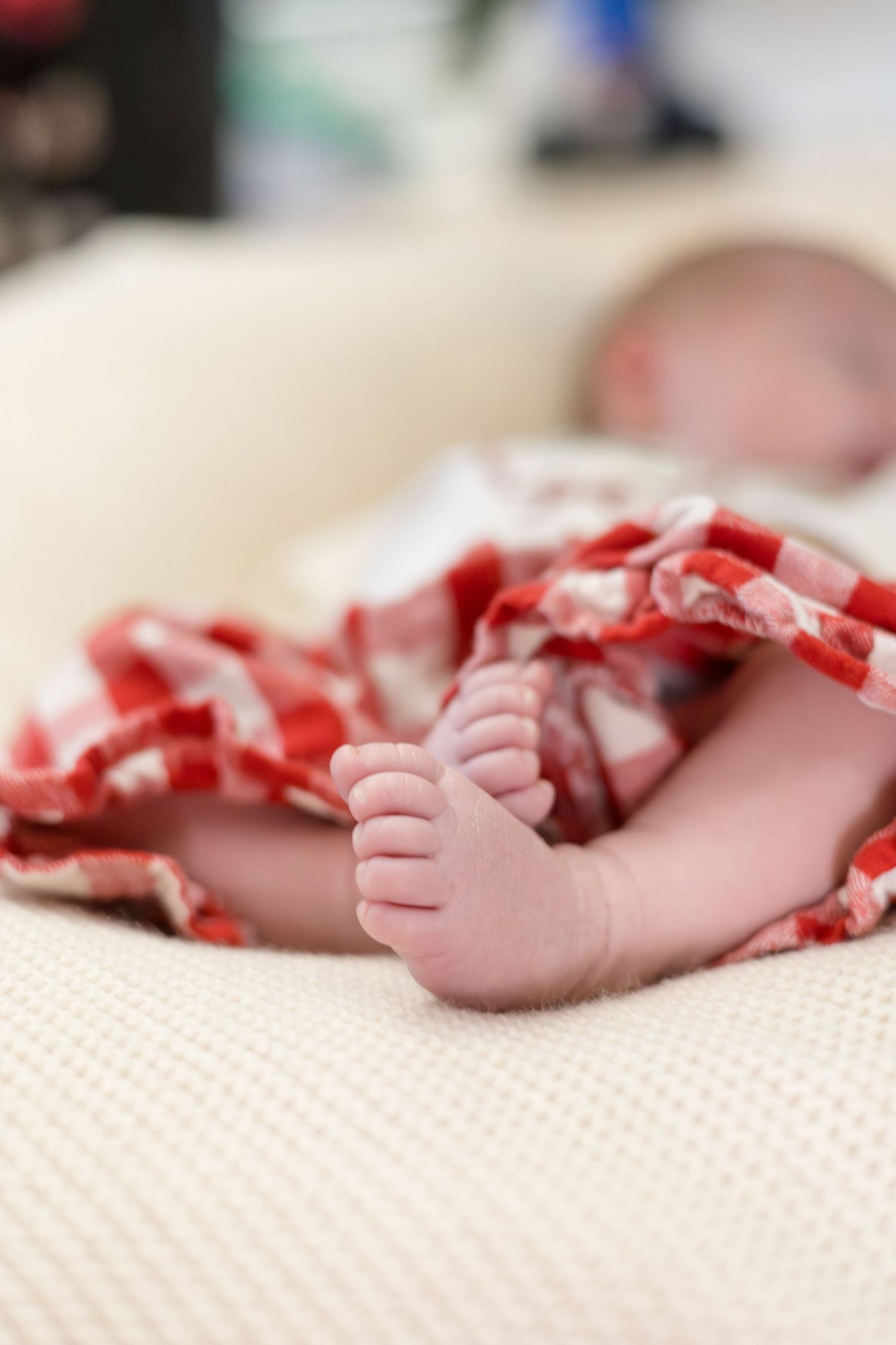Detailed shot of newborn baby during in home lifestyle newborn session with McKinney newborn photographer Reagan Marie Photography