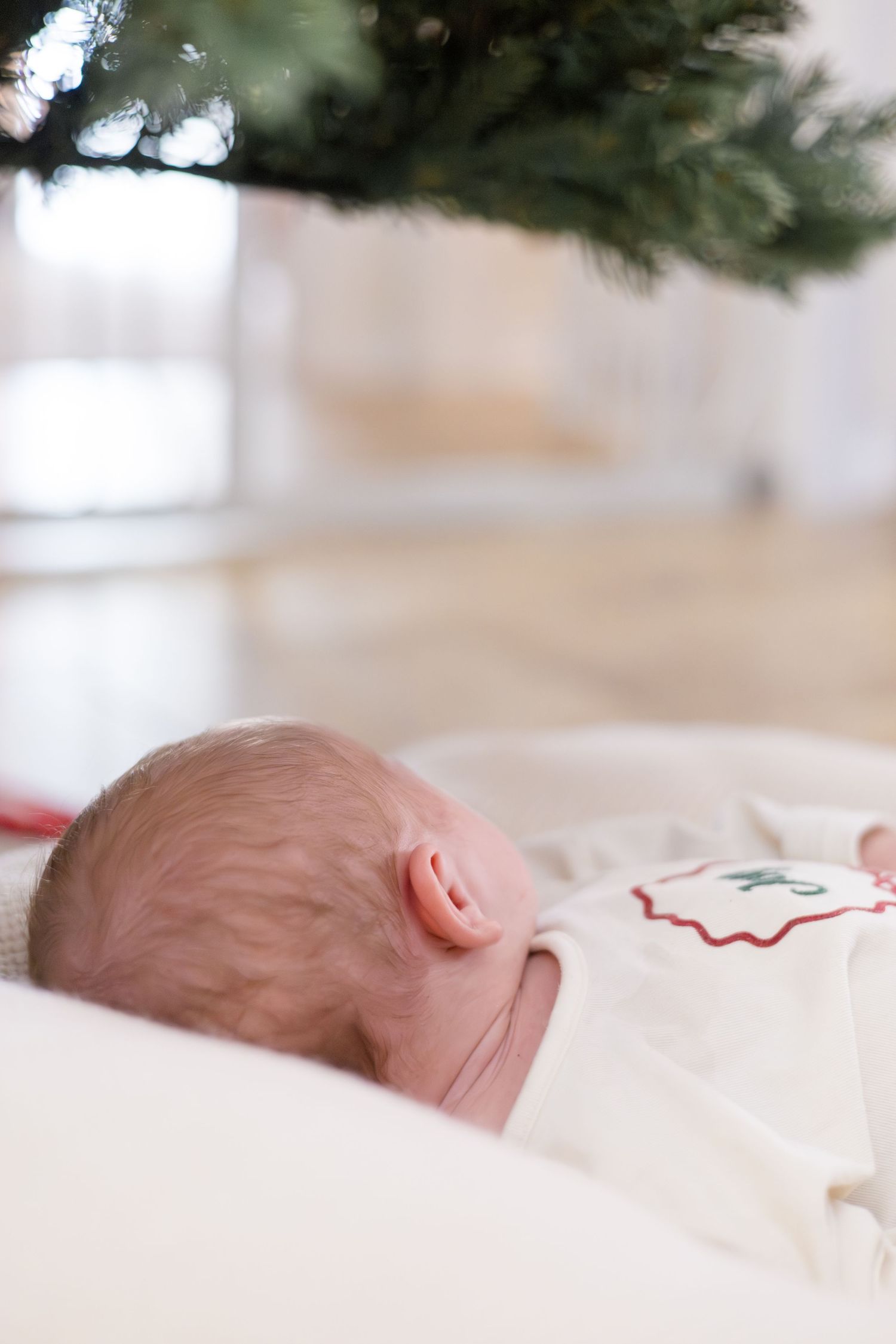 Detailed shot of newborn baby during in home lifestyle newborn session with McKinney newborn photographer Reagan Marie Photography