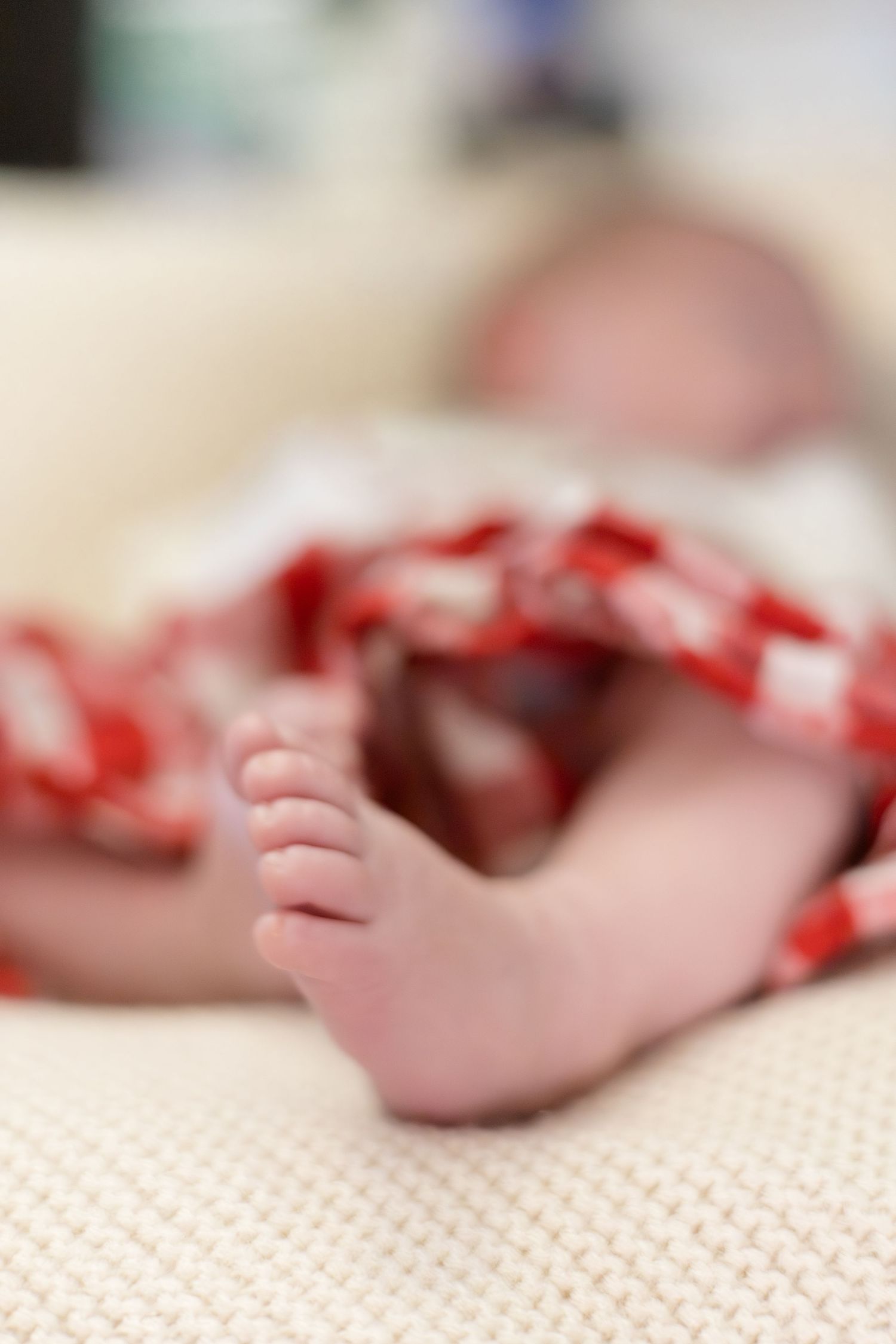 Detailed shot of newborn baby during in home lifestyle newborn session with McKinney newborn photographer Reagan Marie Photography