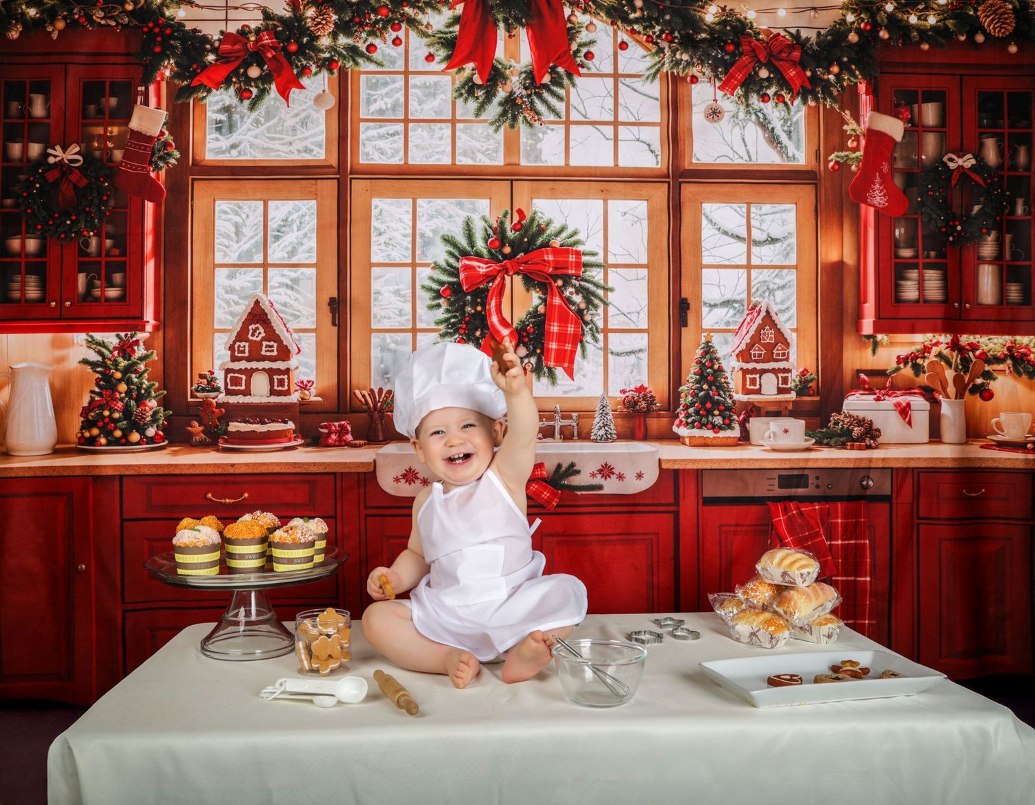 Infant festive bakery display with Christmas decorations, pastries, and treats arranged on a wooden counter in a cozy setting.