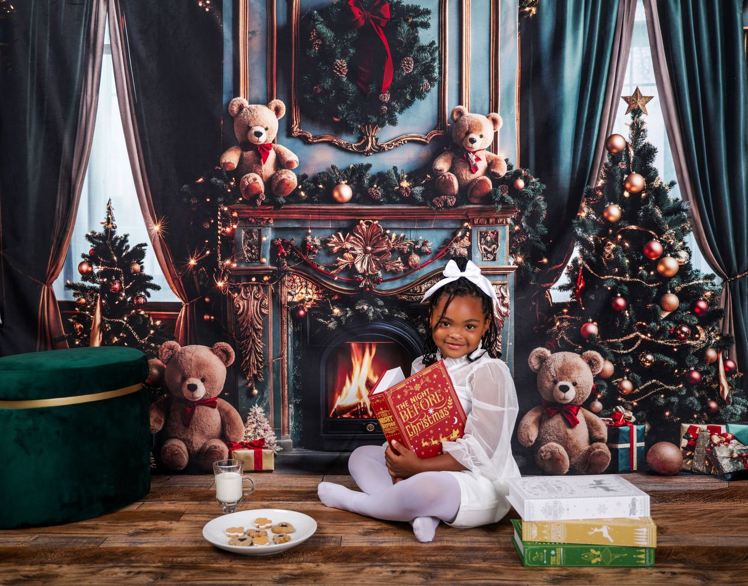 Cuddled up near a cozy holiday fireplace with teddy bears, milk and cookies, and decorated Christmas trees .