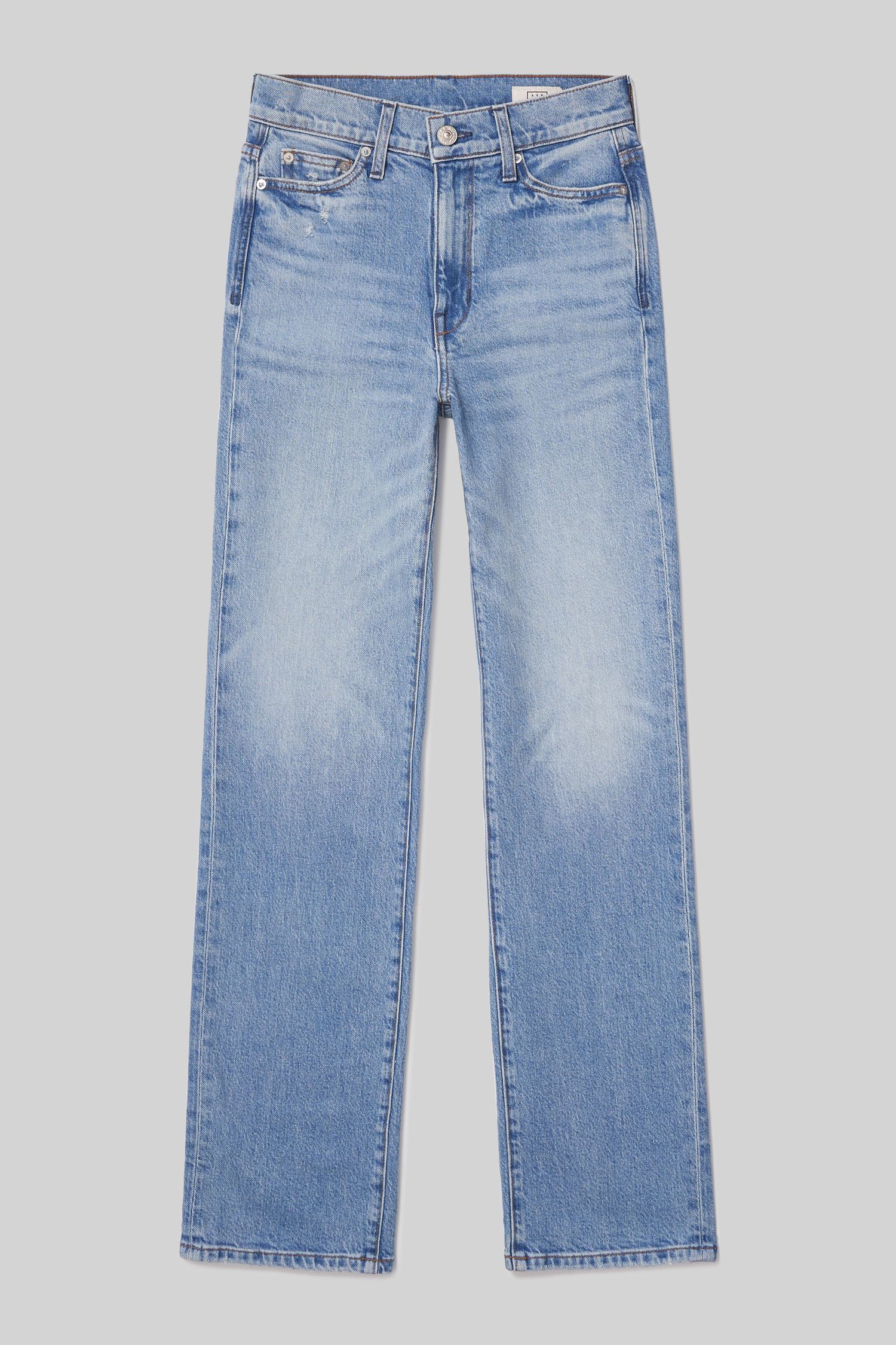 bootcut women's jeans on gray paper