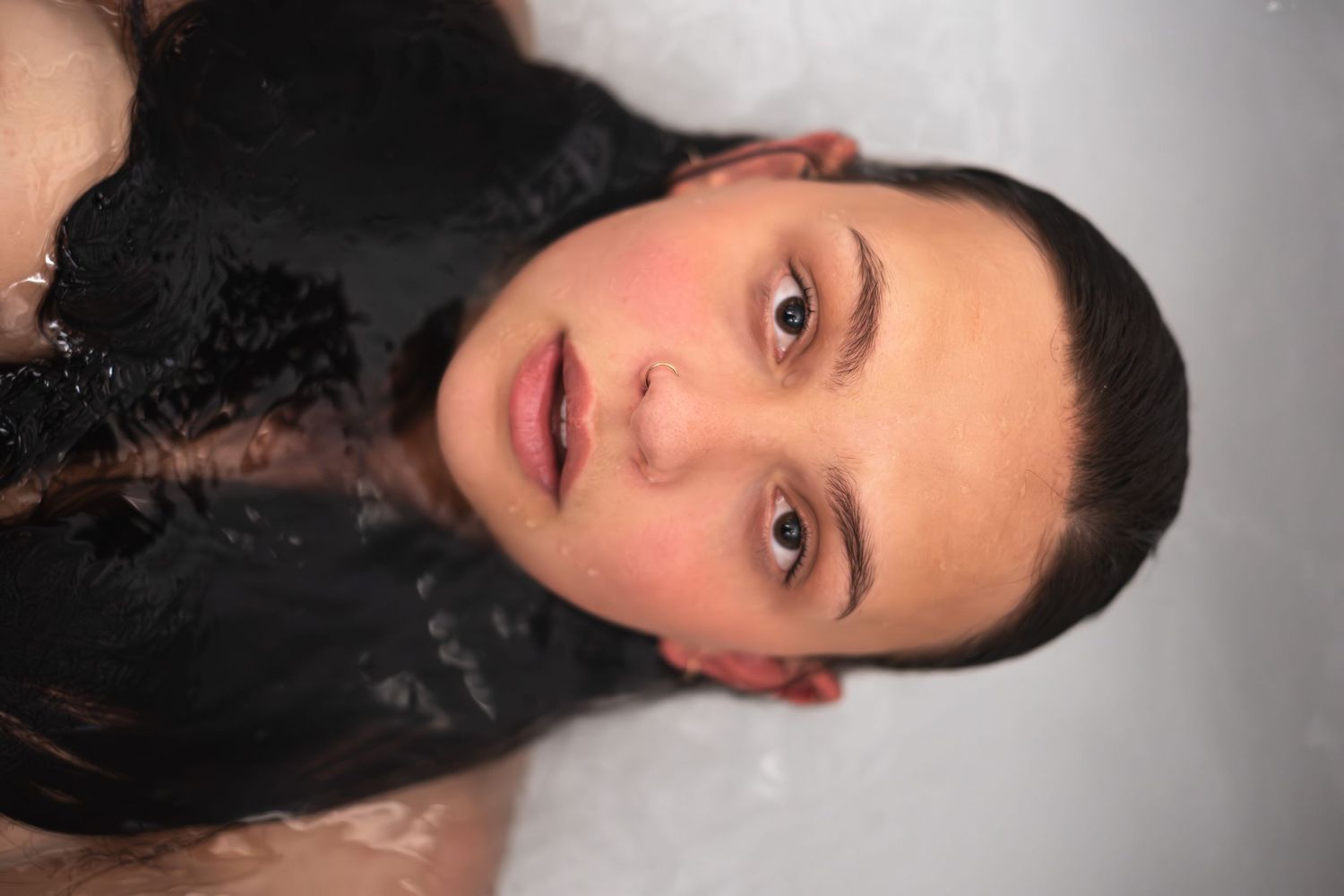 Cinematic music video still featuring an artist performance