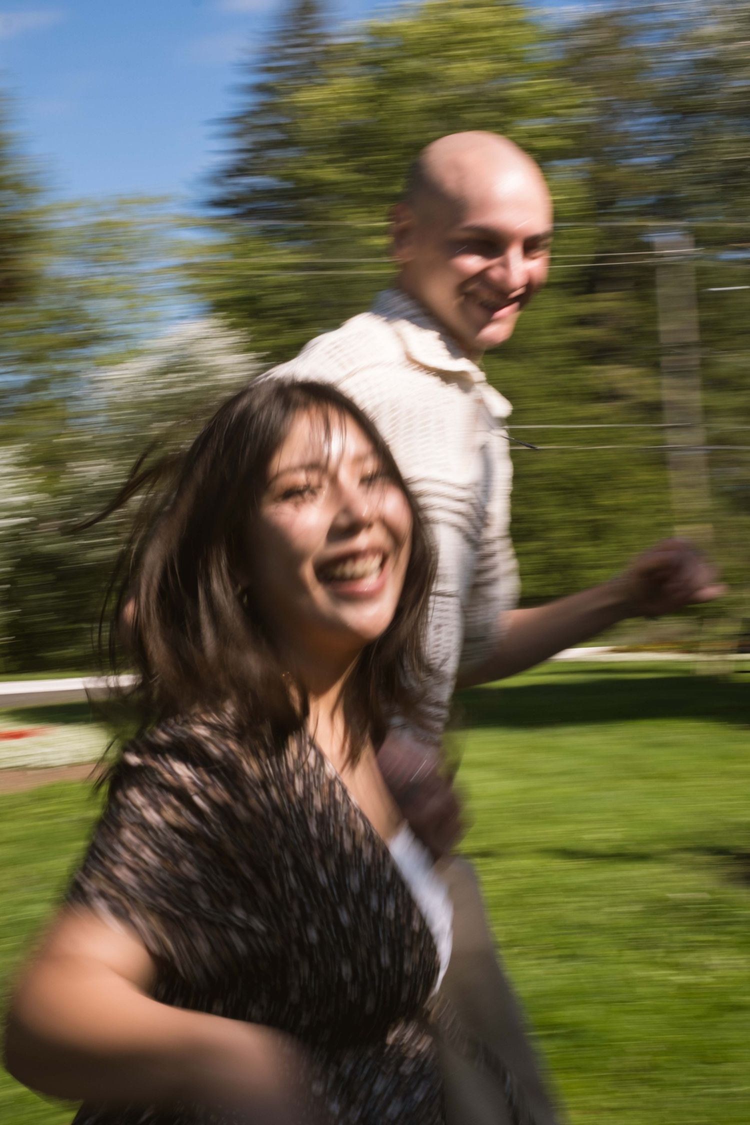 Documentary-style couples photography with genuine interaction. Couple and engagement photo in Sault Ste. Marie.