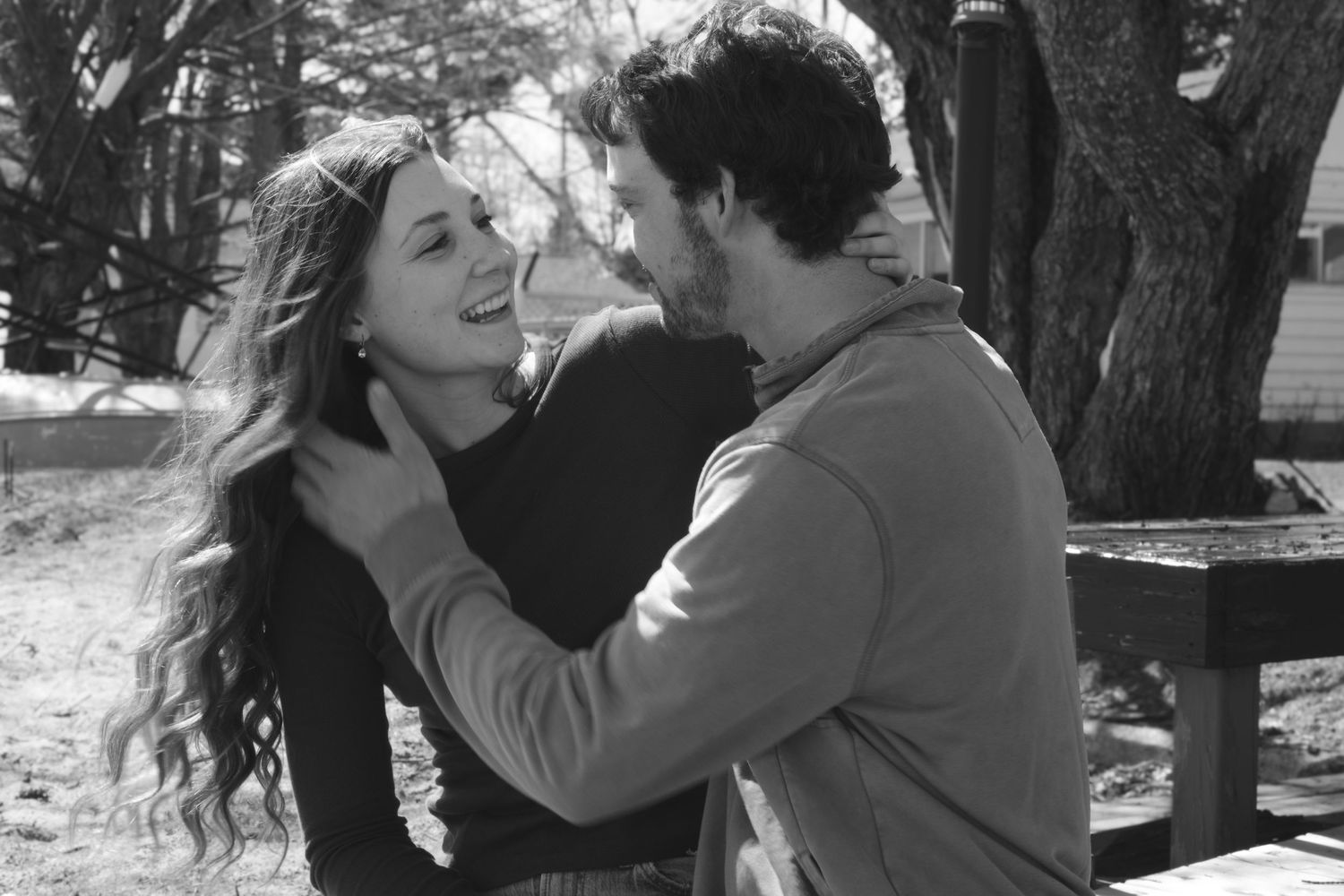 Documentary-style couples photography with genuine interaction. Couple and engagement photo in Sault Ste. Marie.