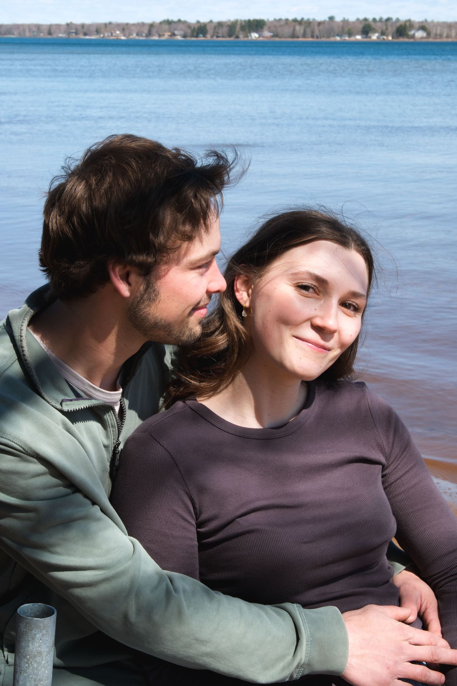 Documentary-style couples photography with genuine interaction. Couple and engagement photo in Sault Ste. Marie.