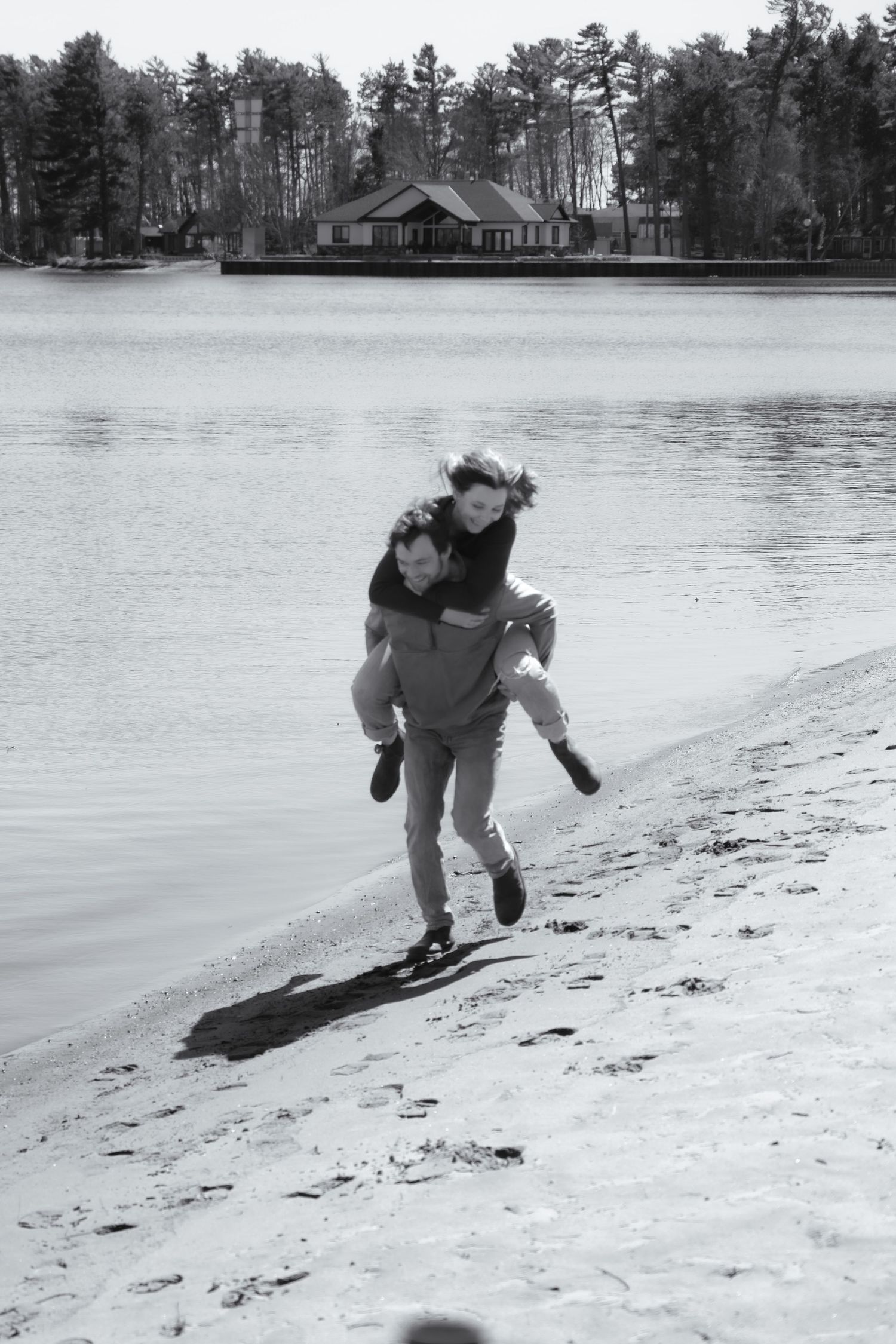 Documentary-style couples photography with genuine interaction. Couple and engagement photo in Sault Ste. Marie.