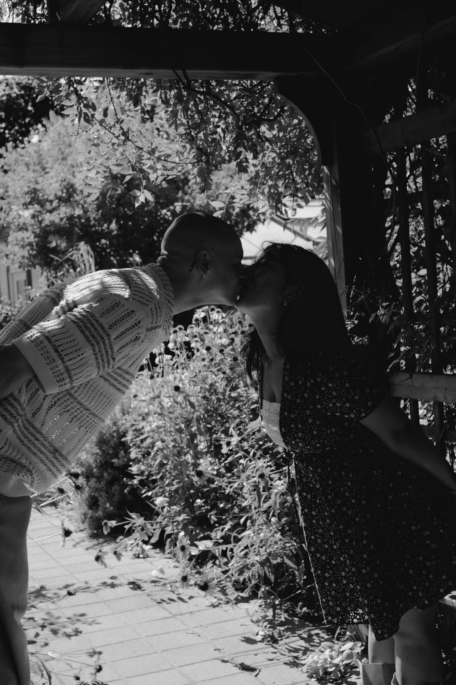 Documentary-style couples photography with genuine interaction. Couple and engagement photo in Sault Ste. Marie.