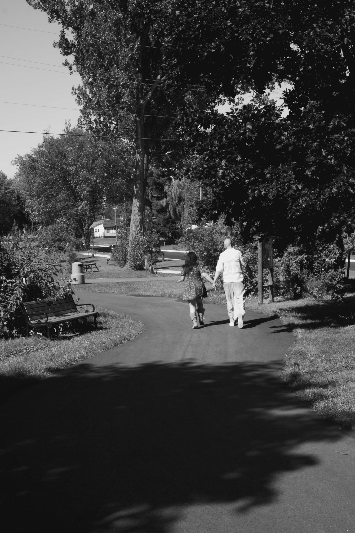 Documentary-style couples photography with genuine interaction. Couple and engagement photo in Sault Ste. Marie.