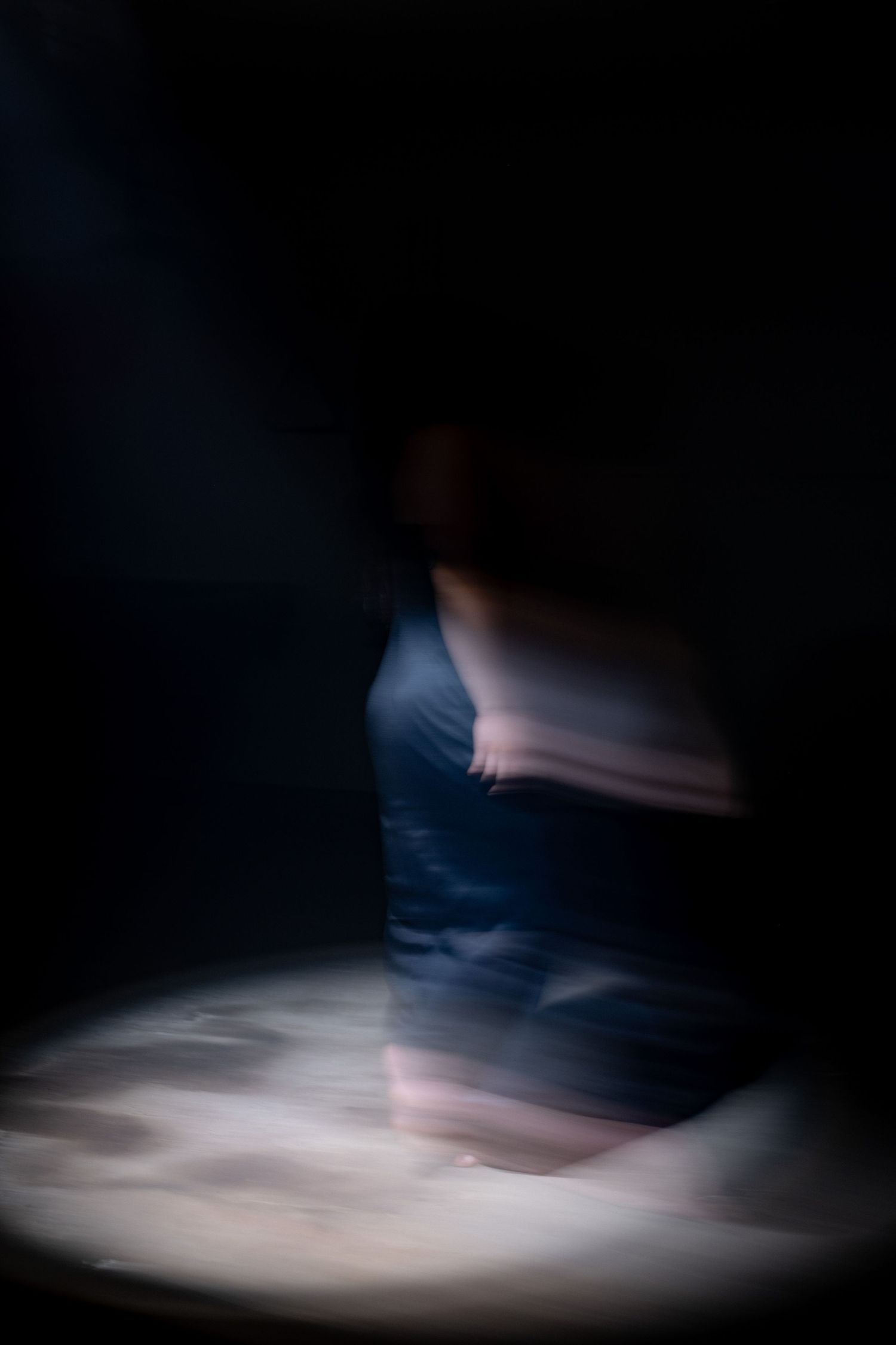 Cinematic music video still featuring an artist performance