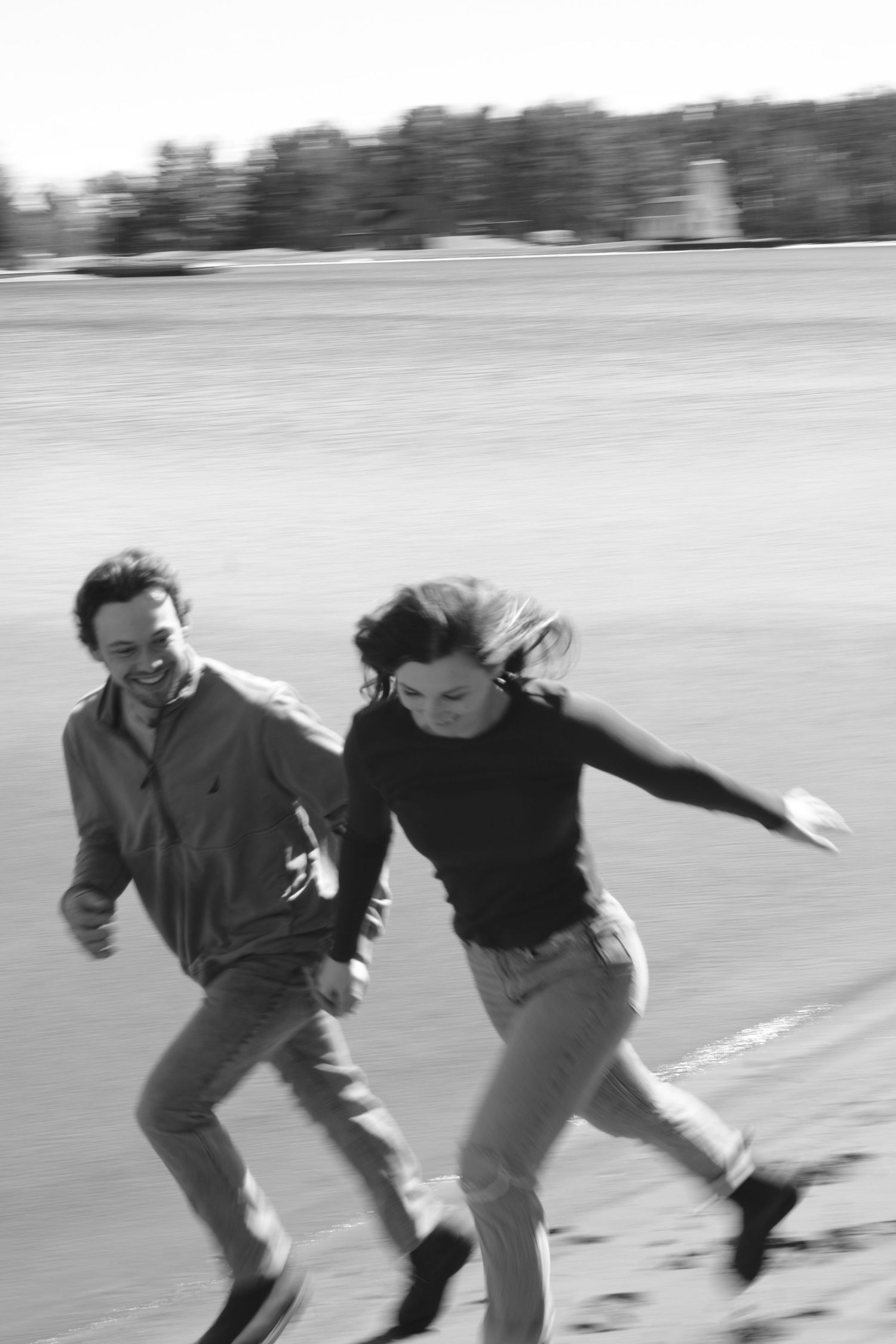 Documentary-style couples photography with genuine interaction. Couple and engagement photo in Sault Ste. Marie.