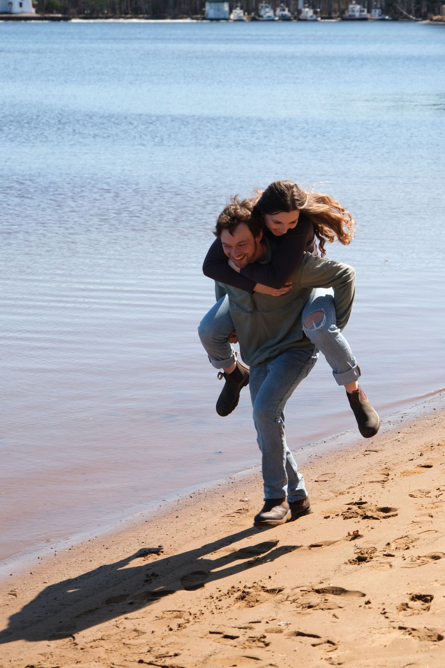 Documentary-style couples photography with genuine interaction. Couple and engagement photo in Sault Ste. Marie.