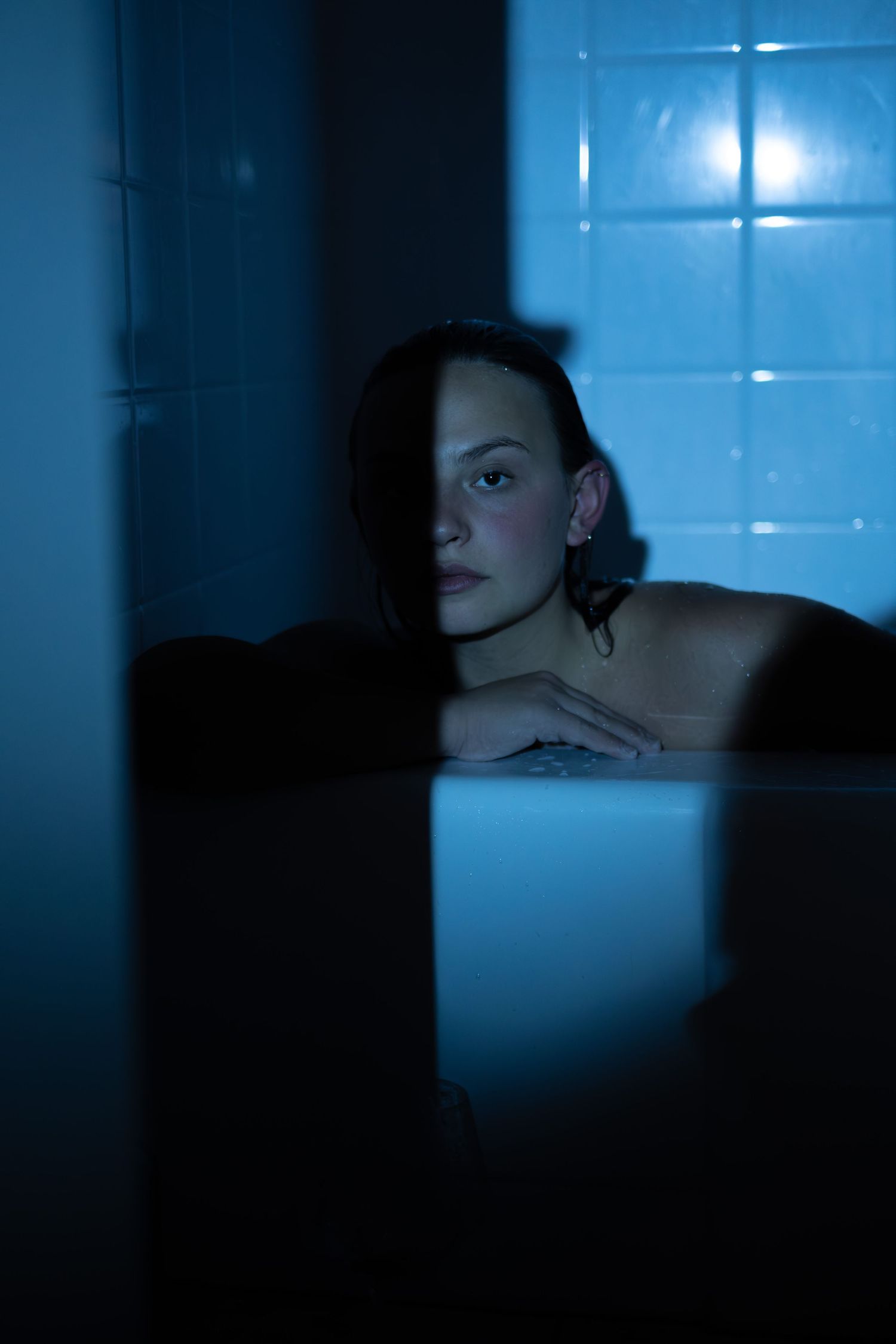 Cinematic music video still featuring an artist performance