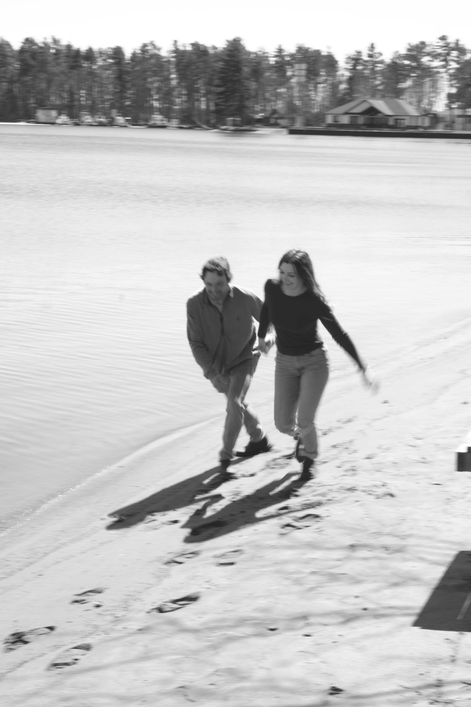 Documentary-style couples photography with genuine interaction. Couple and engagement photo in Sault Ste. Marie.