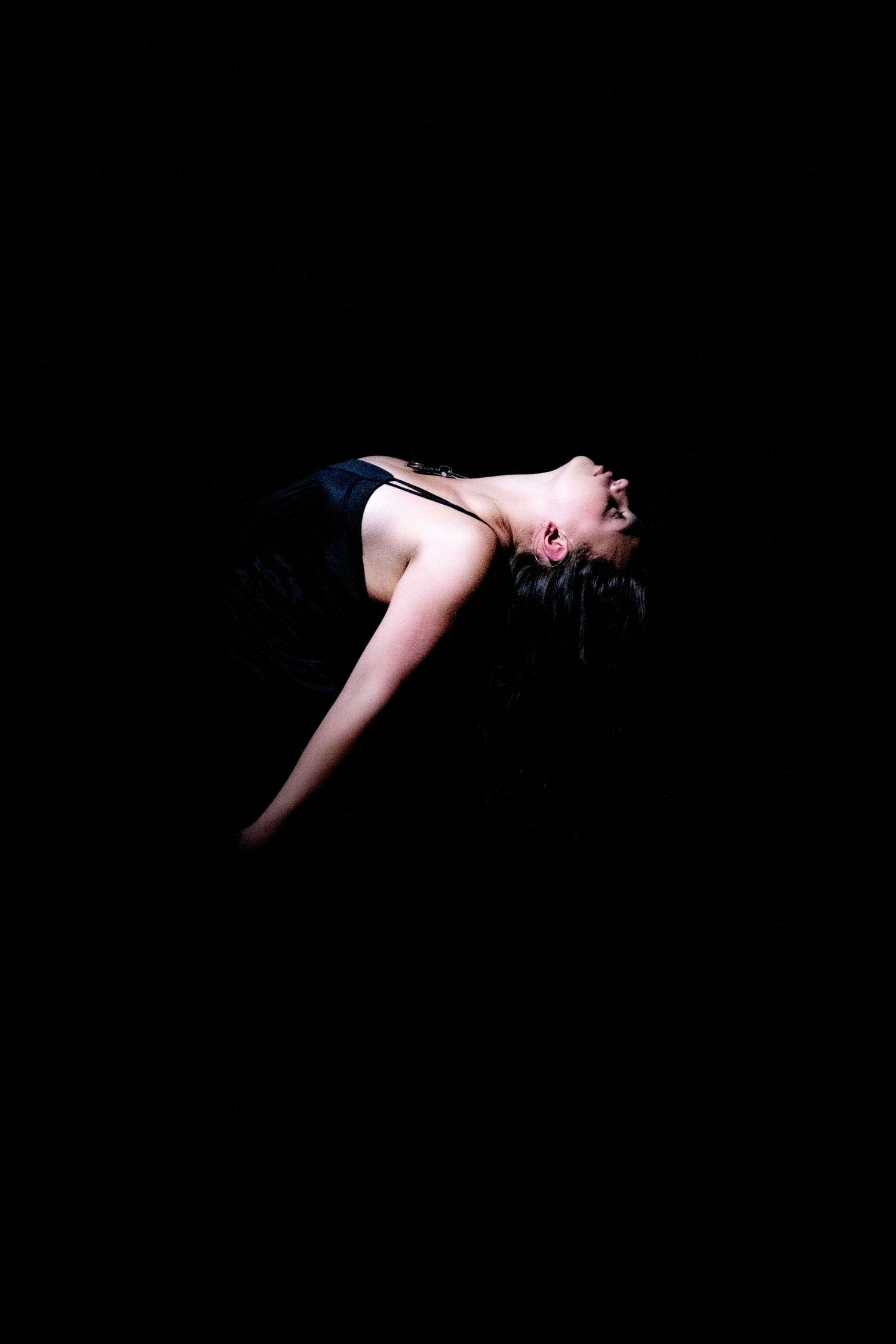 Creative portrait photography with intentional lighting and mood.