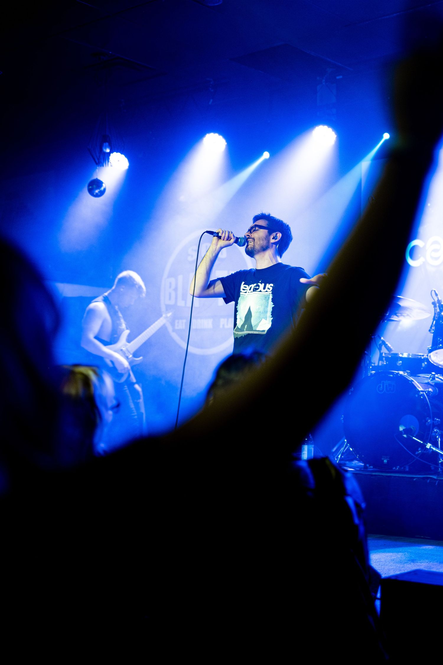 Live event photography showcasing candid interactions. Concert photography and videography in Sault Ste. Marie.