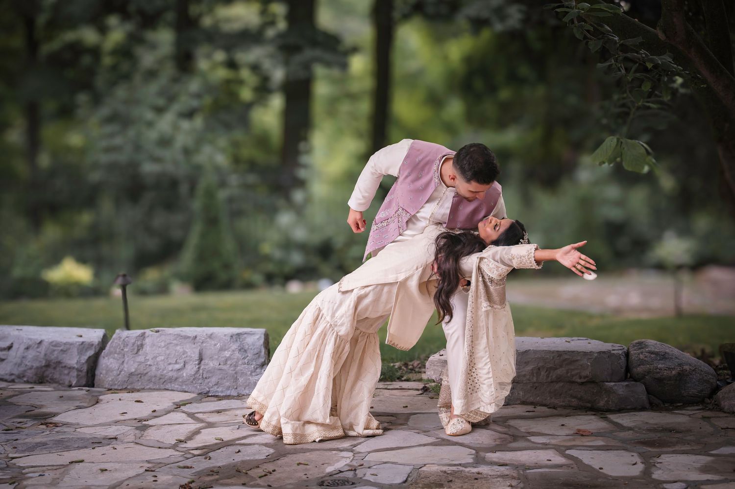 Artistic outdoor photography sequence featuring romantic poses on stone steps.