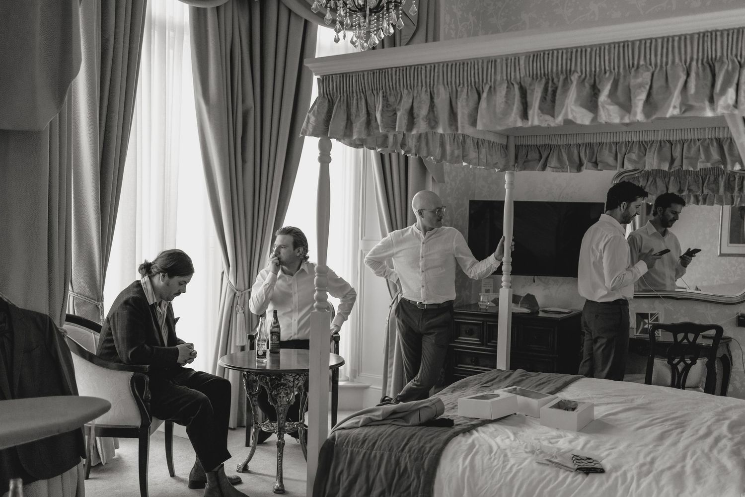 Interior of an elegant hotel room with classic curtains and furnishings.