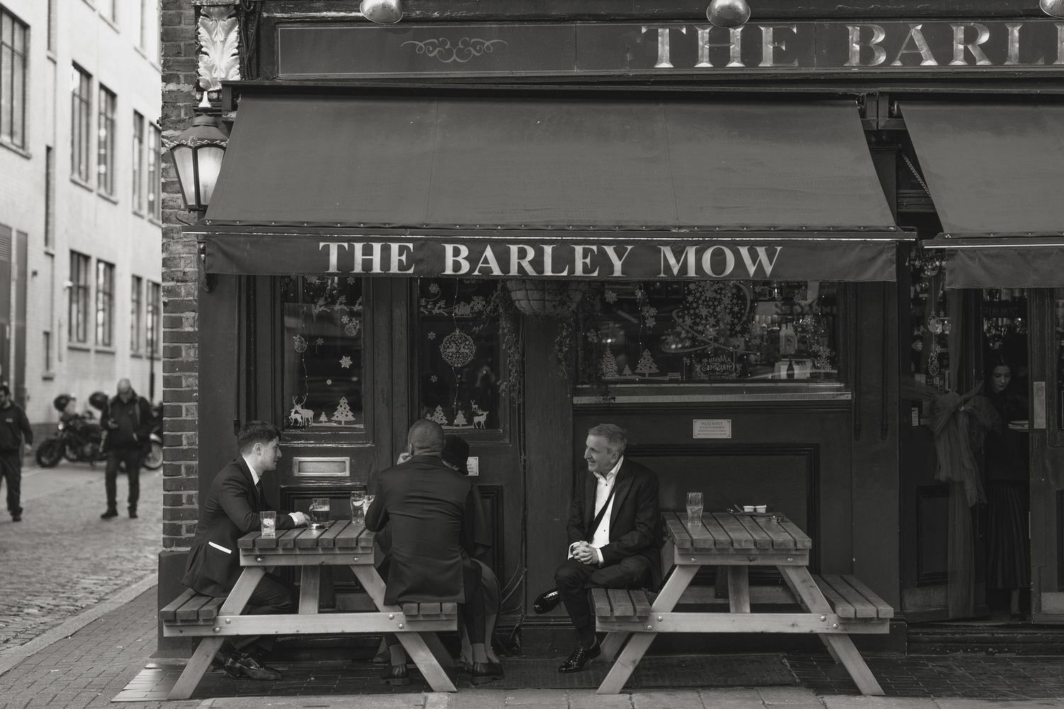 Exterior view of The Barley Mow establishment with classic storefront signage.