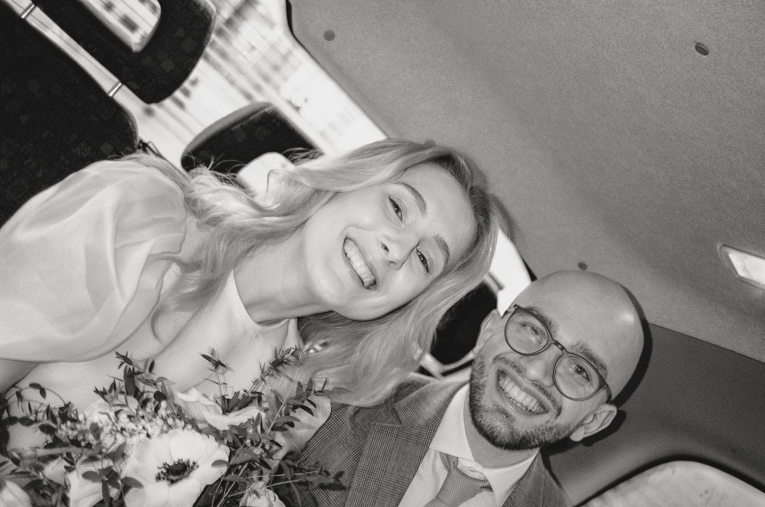 Black and white candid photos capturing joyful moments during a wedding celebration.