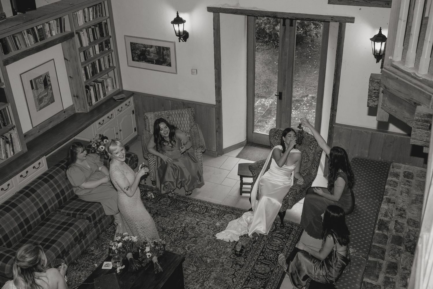 Vintage black and white photographs arranged in a filmstrip style sequence showing a wedding ceremony.