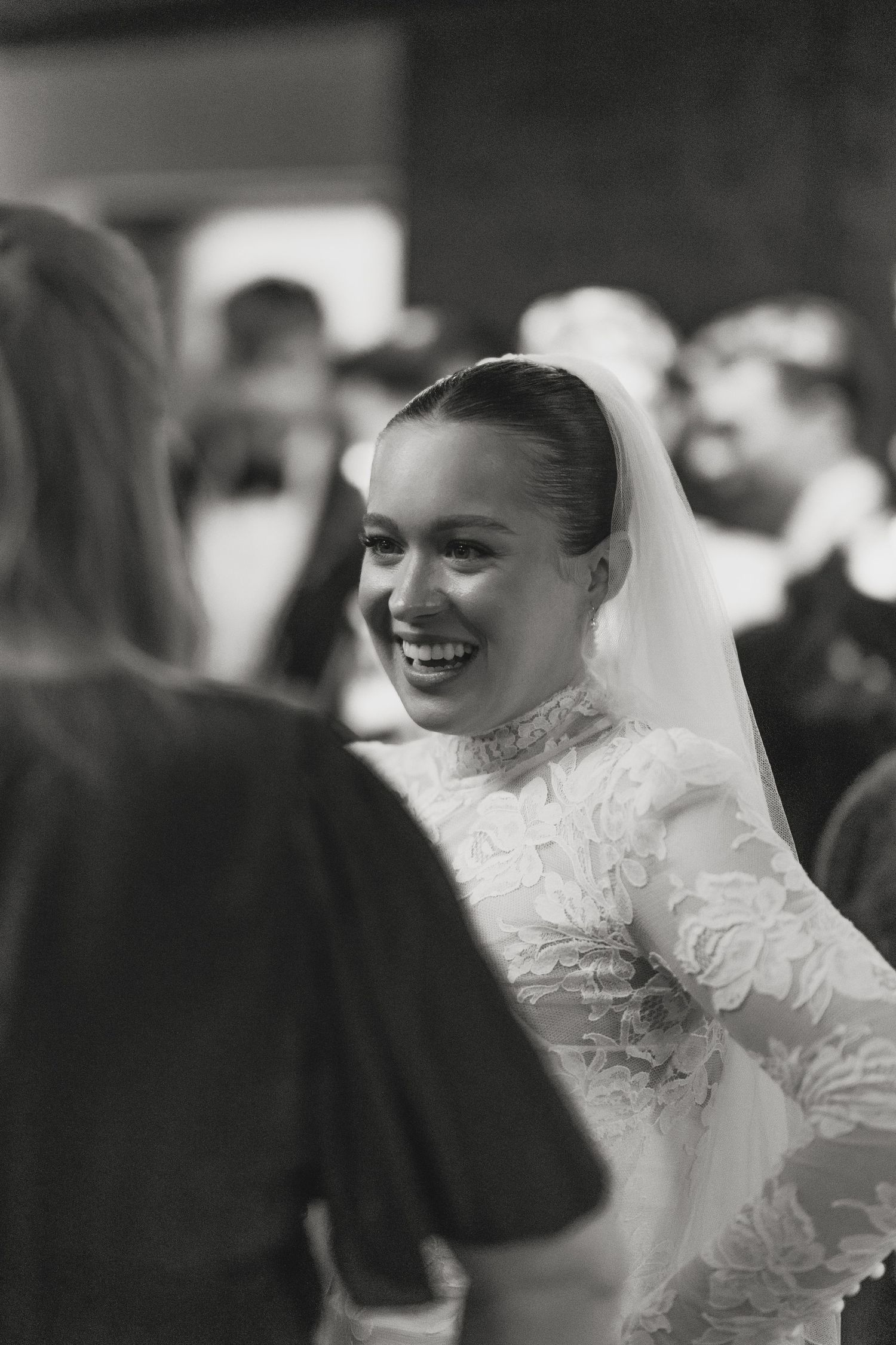 Wedding celebration captured in elegant black and white photography.