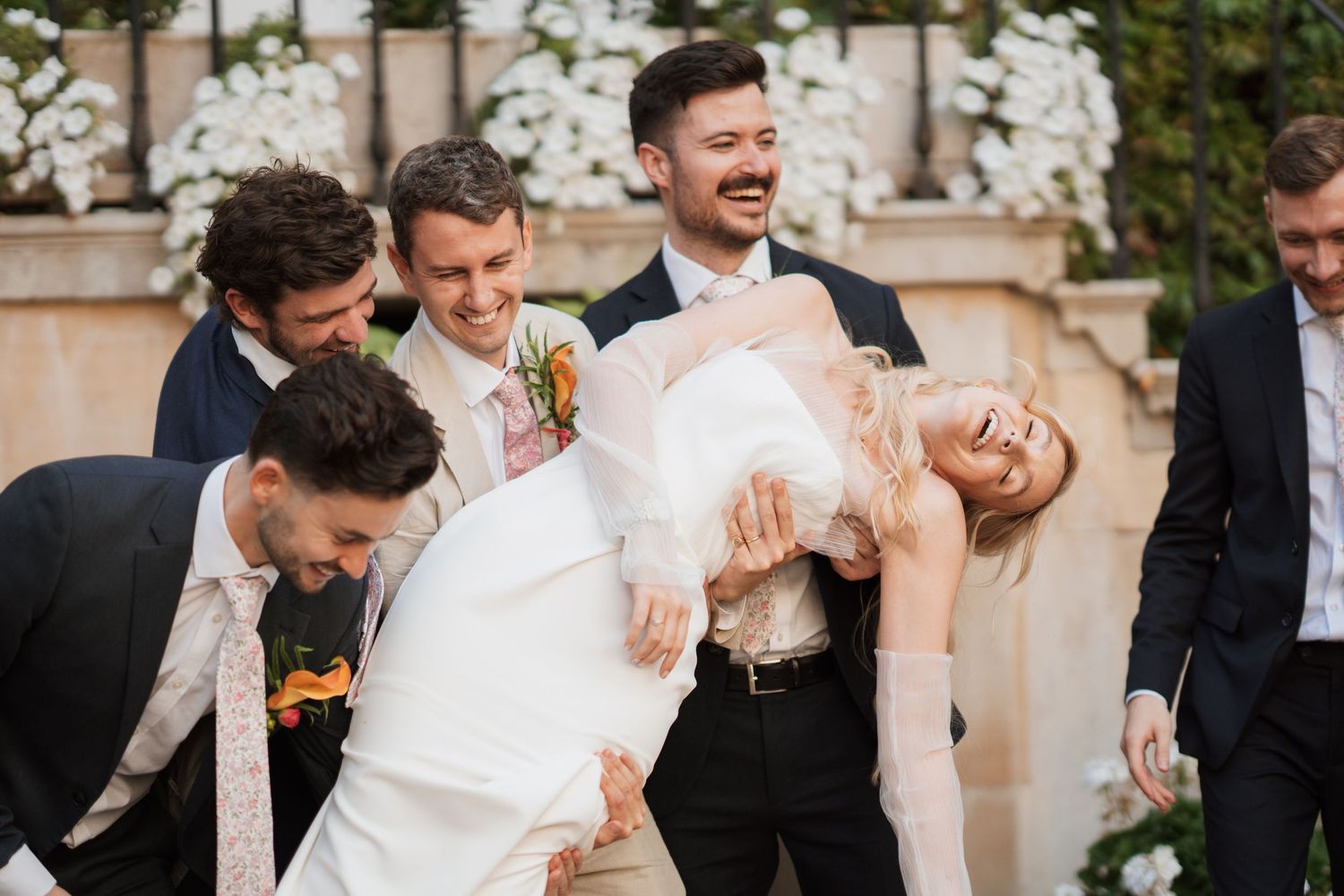 Candid wedding photos showing natural laughter and celebration.