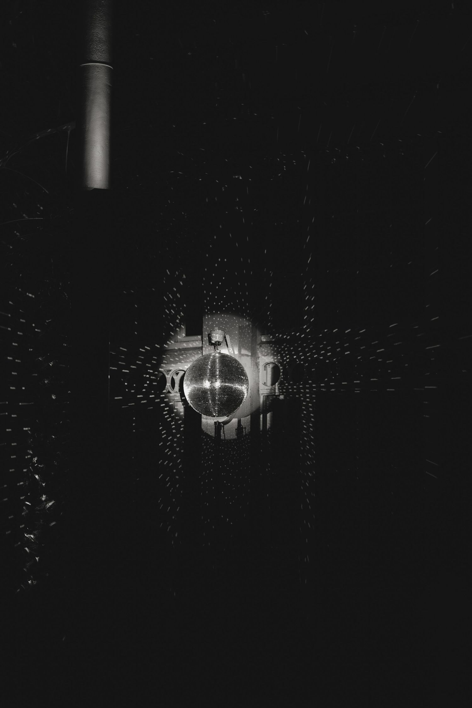 Abstract light patterns creating a dramatic effect in darkness.